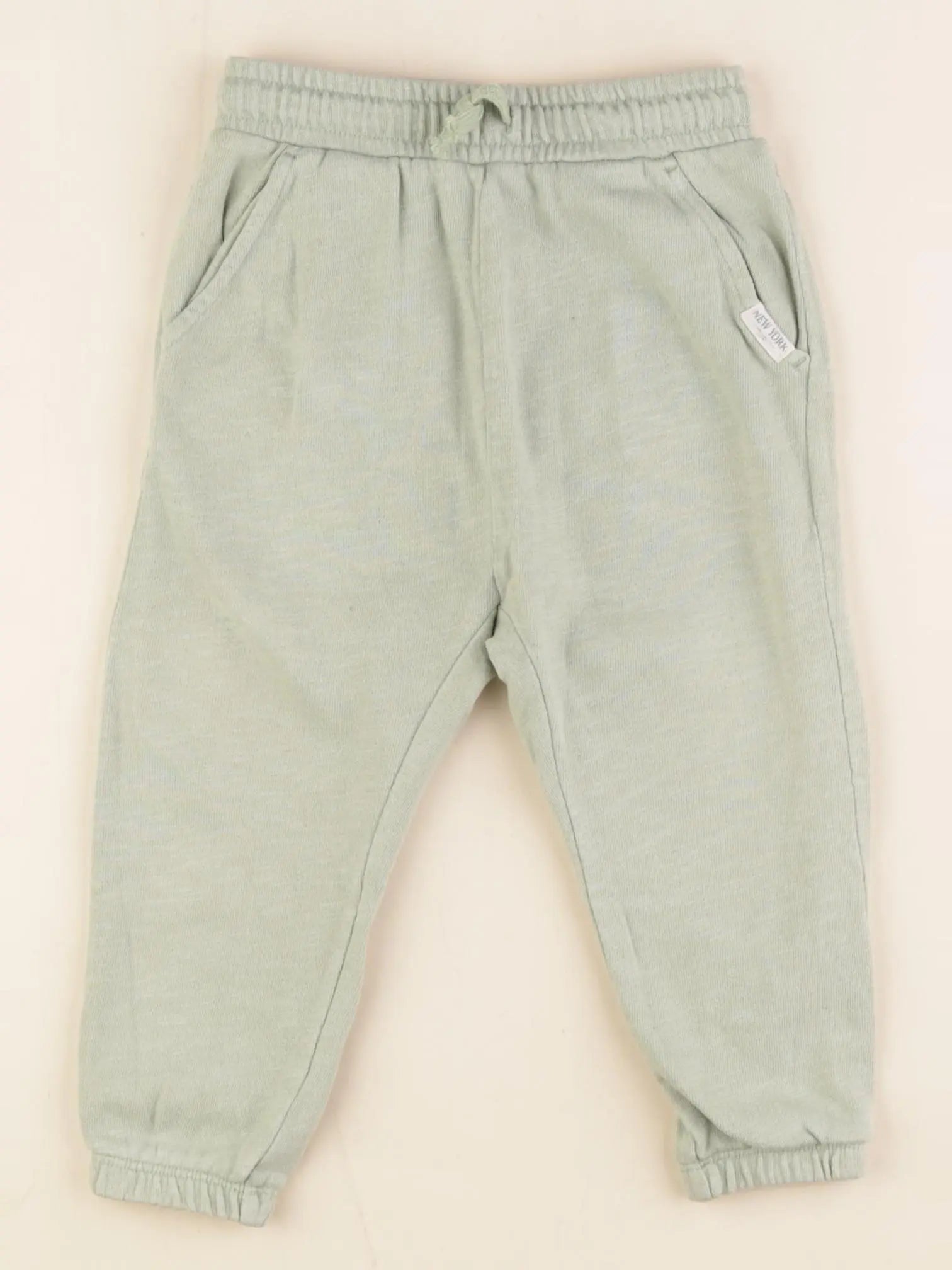 H&M - jogging vert - 12/18 mois