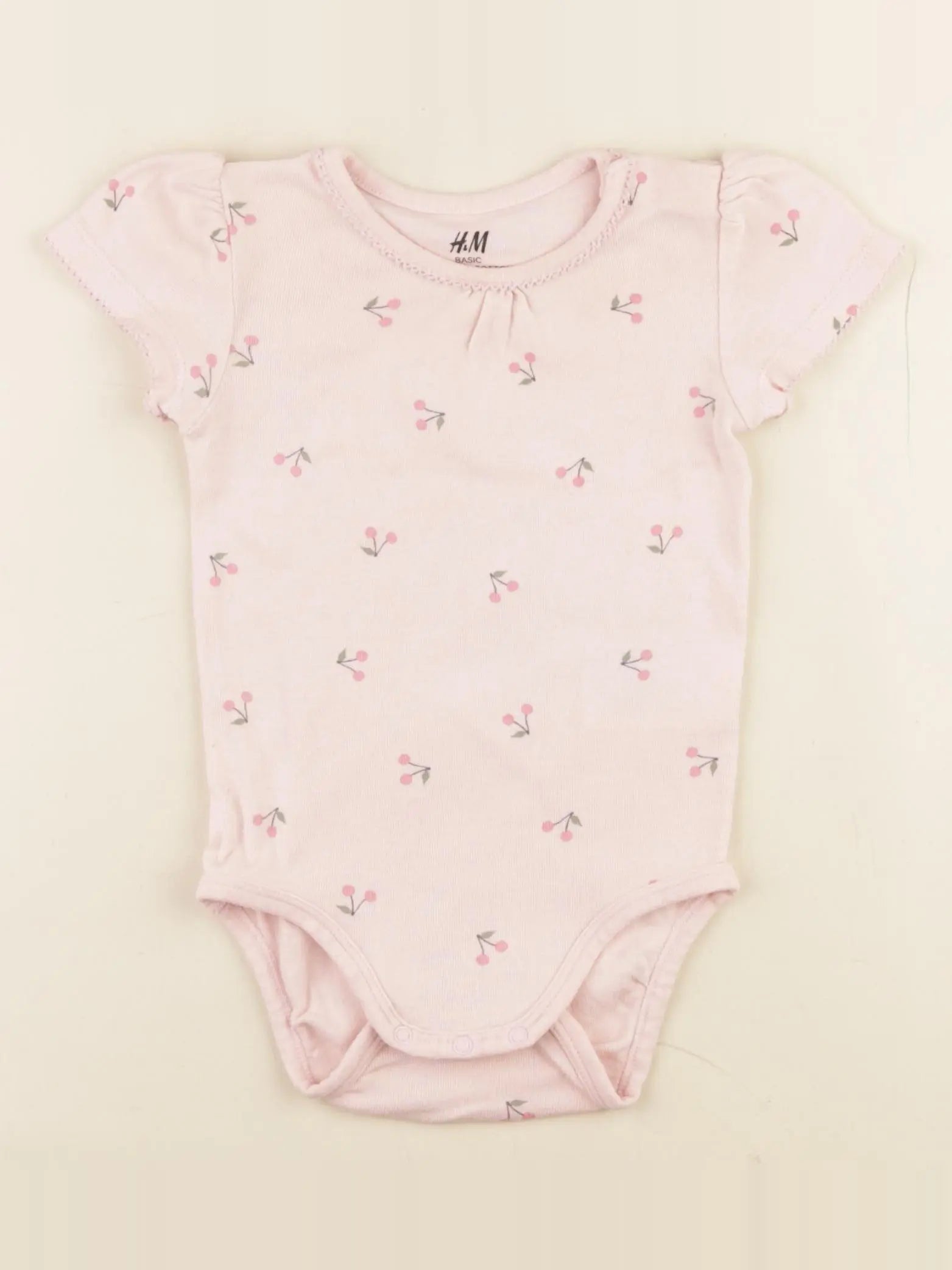 H&M - body rose - 6/9 mois