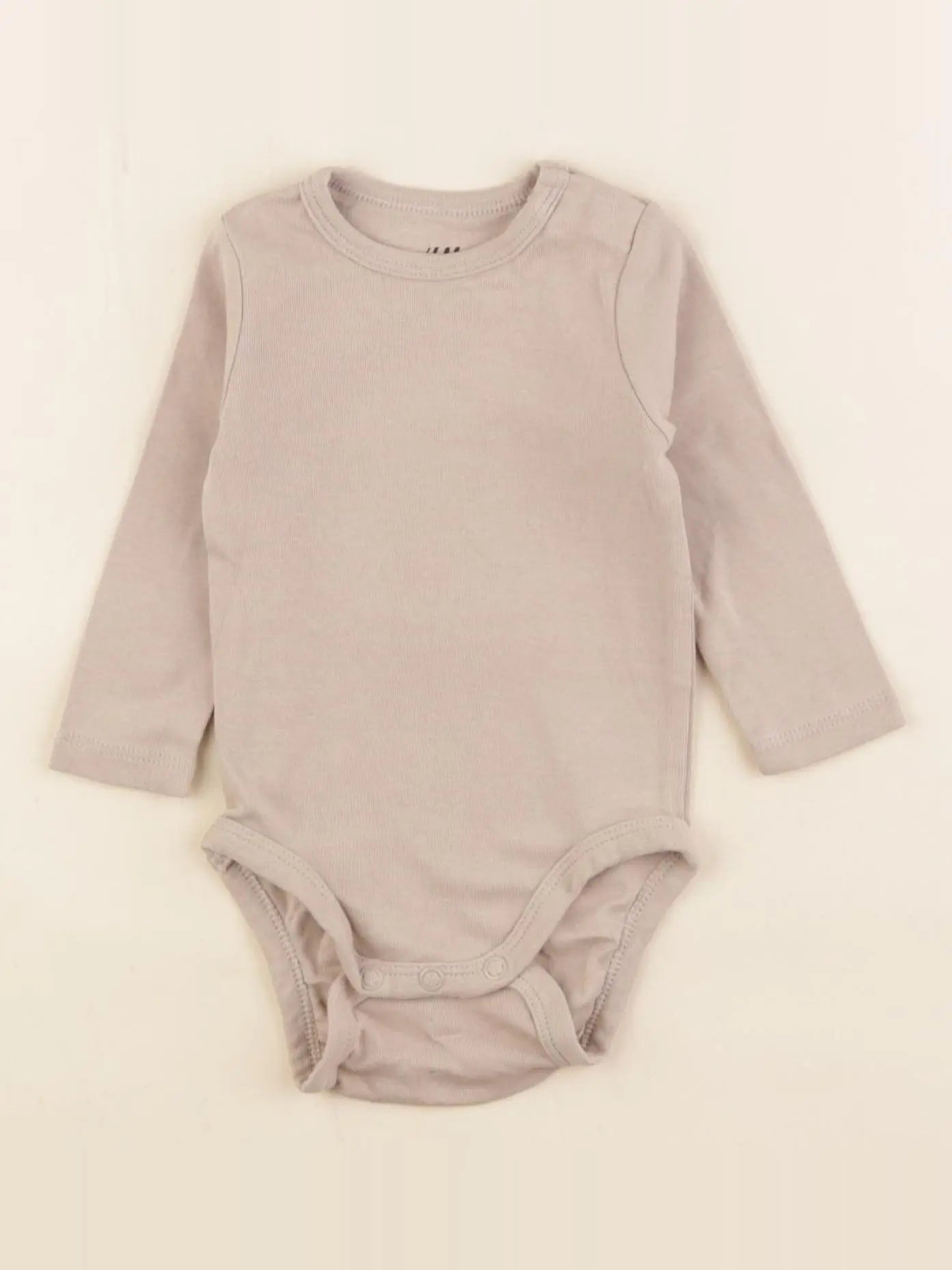 H&M - body beige - 2/4 mois