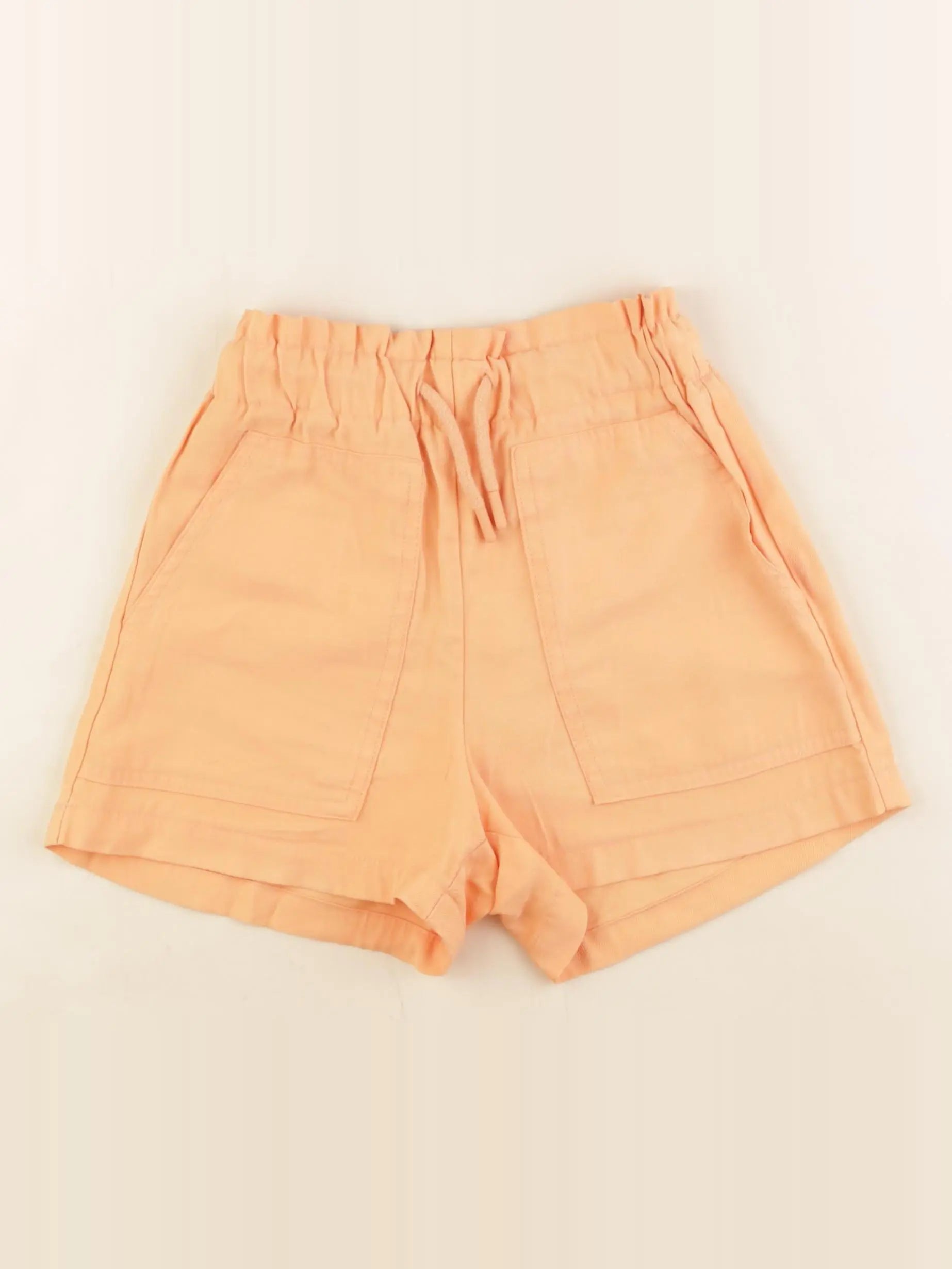 Zara - short orange - 7 ans