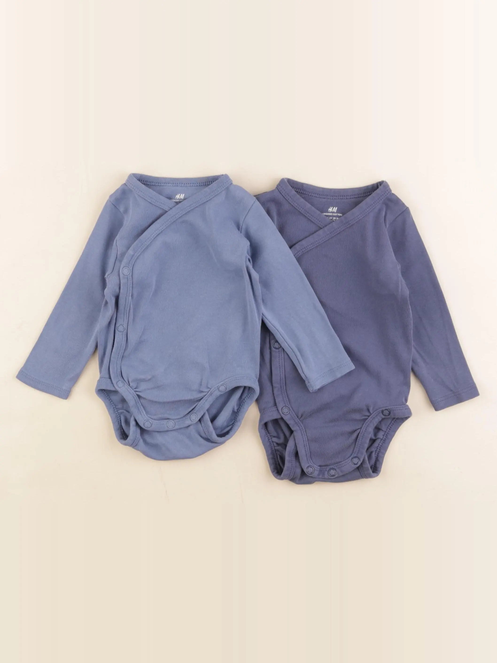 H&M - lot de 2 bodies en coton bleu - 2/4 mois