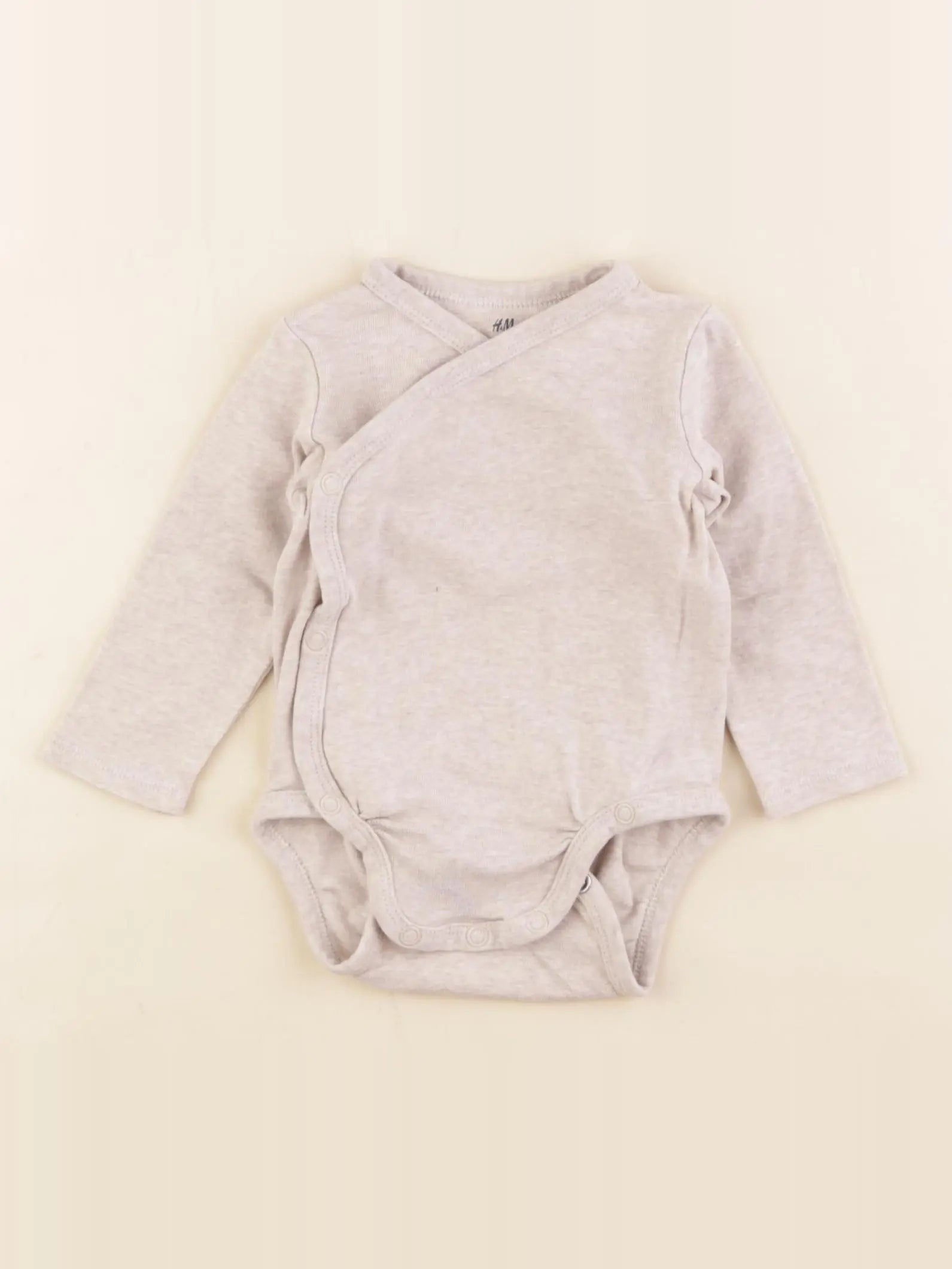 H&M - body beige - 4/6 mois