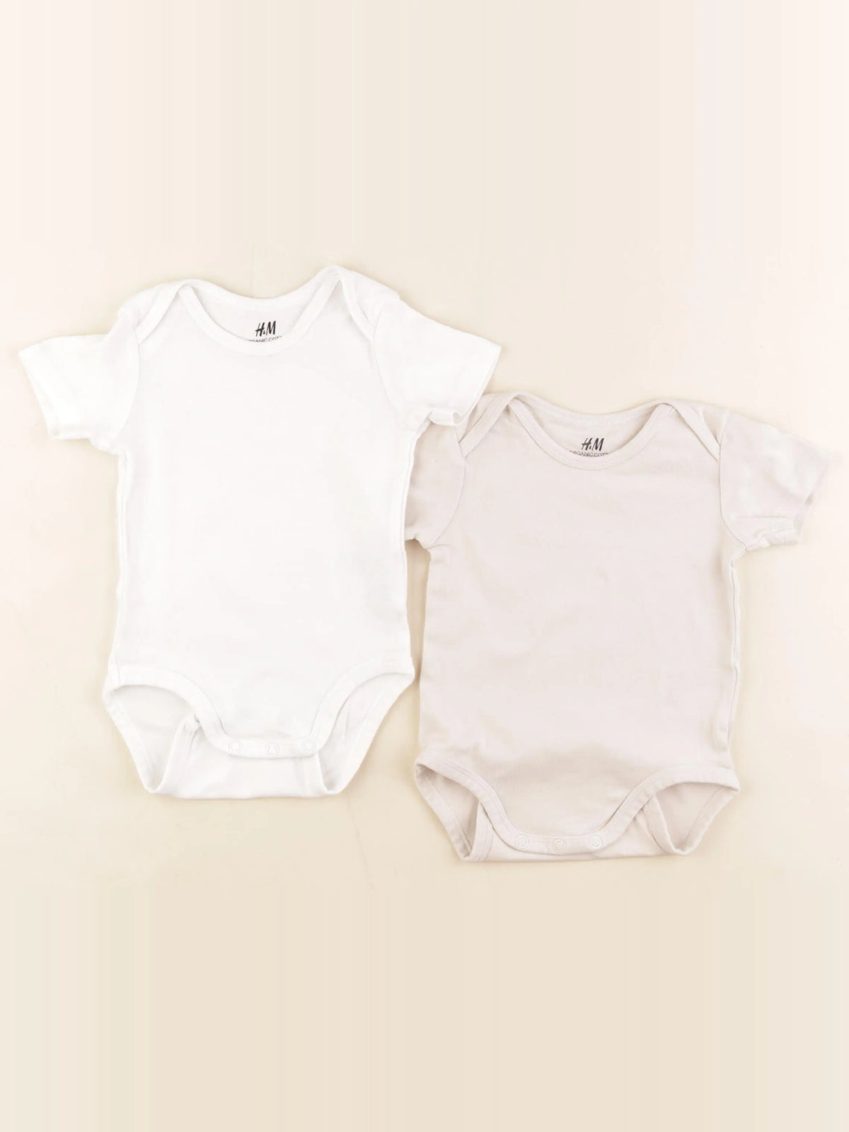H&M - lot de 2 bodies en coton beige, blanc - 4/6 mois
