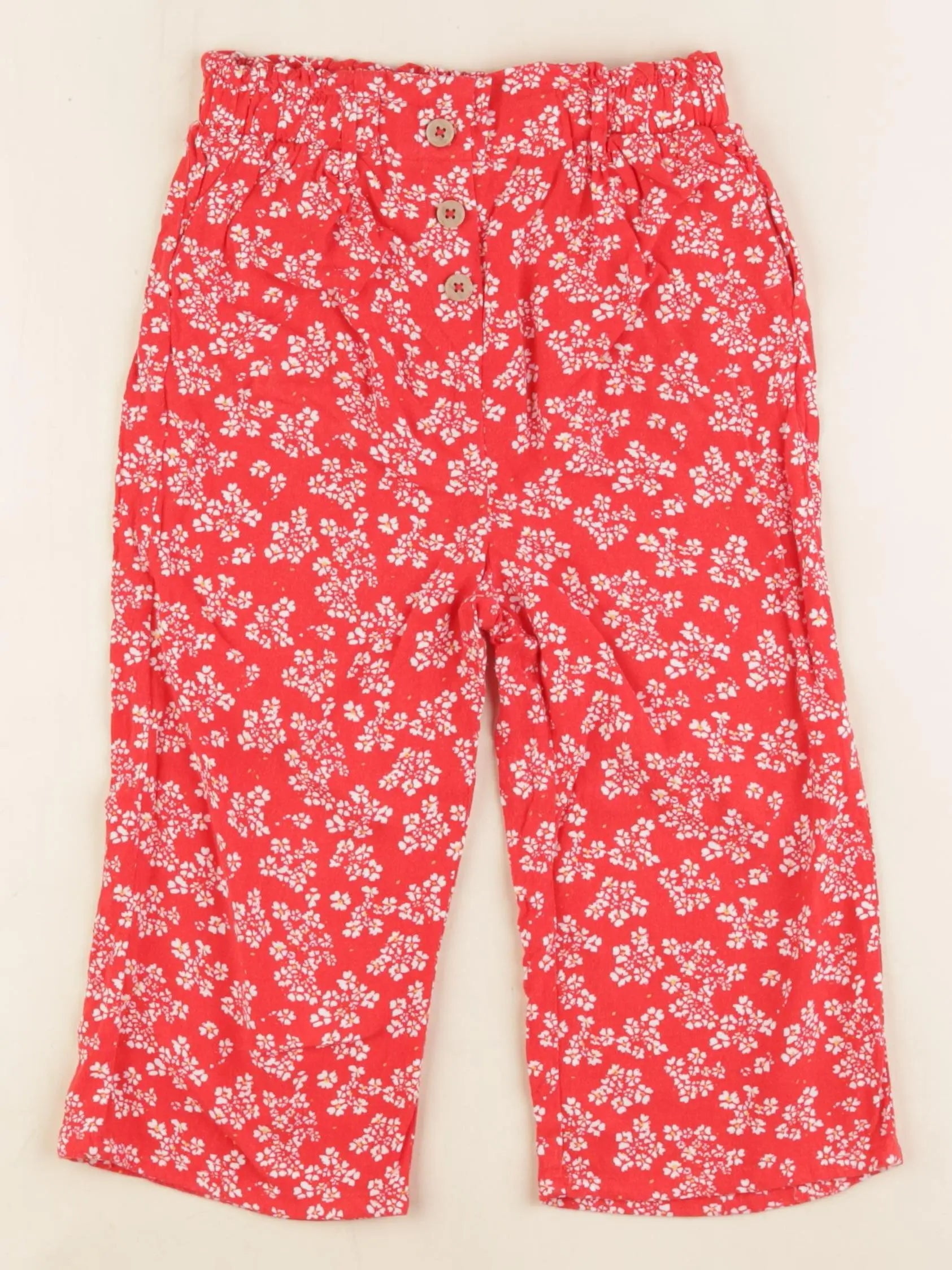 Vertbaudet - pantacourt rouge - 7 ans