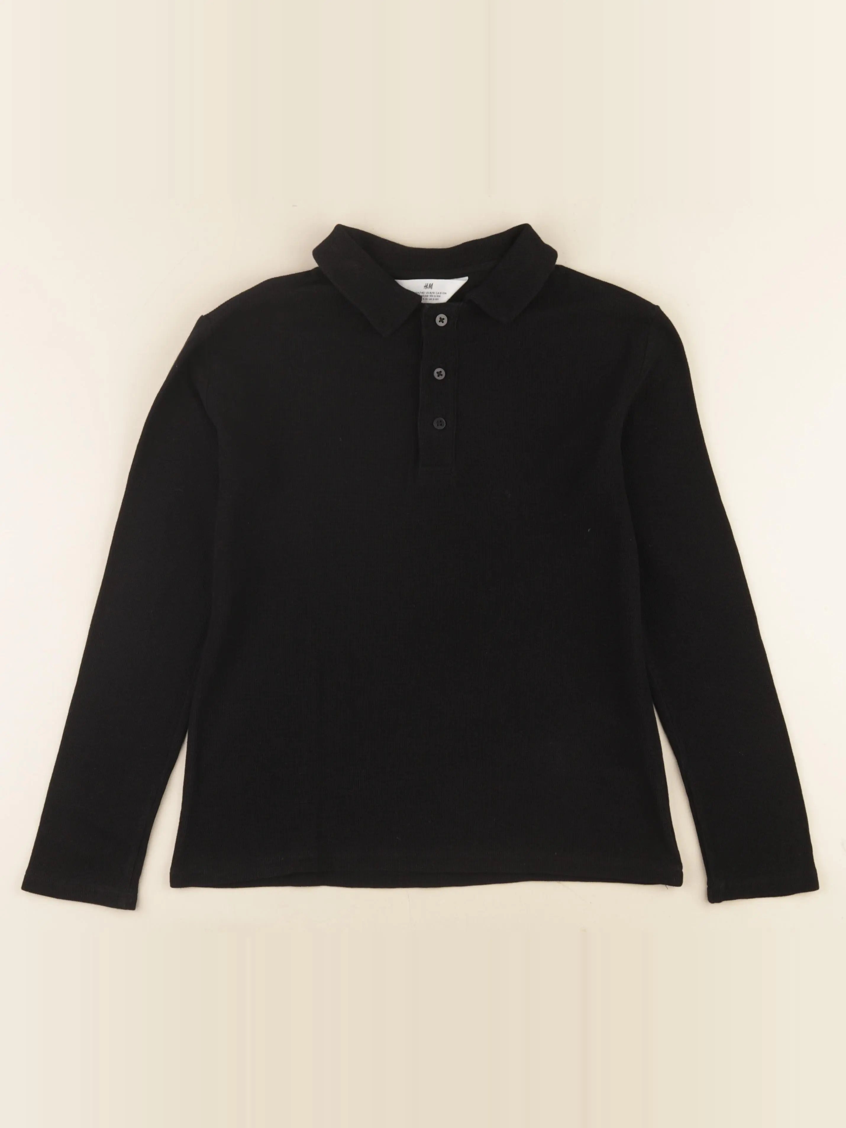 H&M - polo noir - 8/10 ans