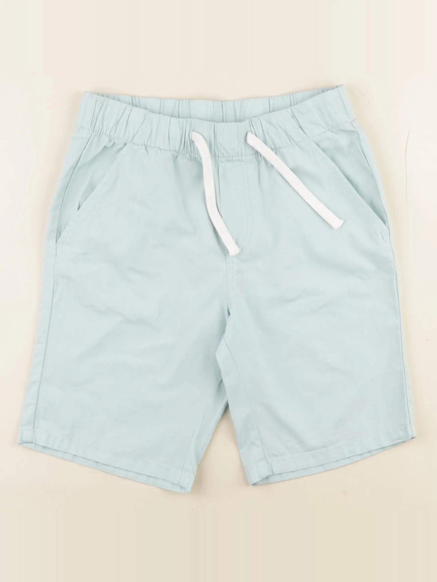 H&M - short vert - 6/7 ans