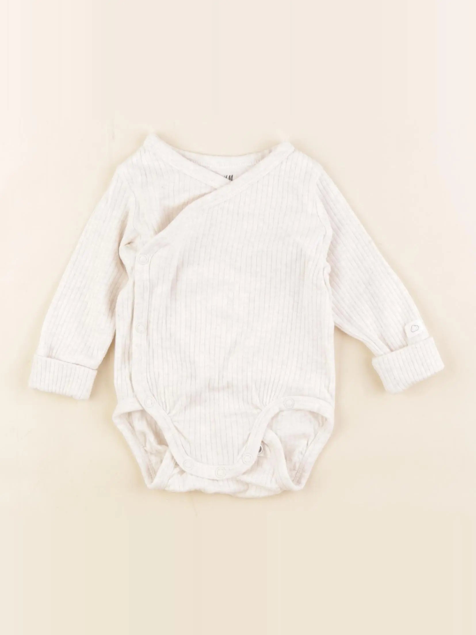 H&M - body beige - 2/4 mois