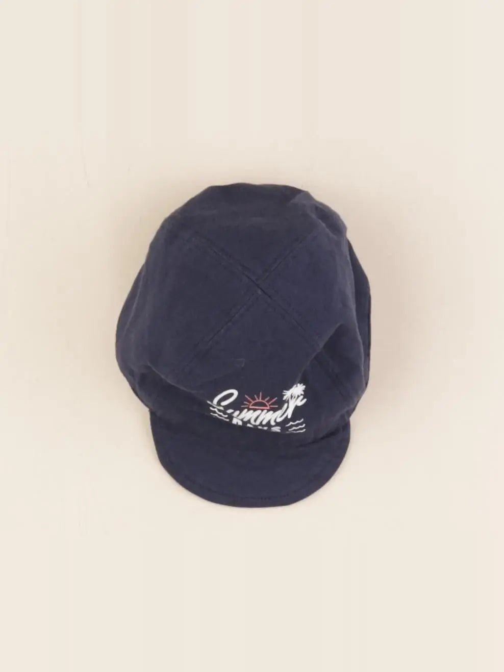 H&M - casquette bleu - 1/2 mois