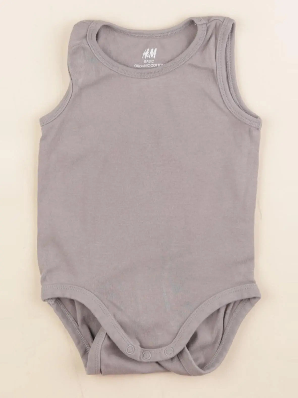 H&M - body gris - 9/12 mois
