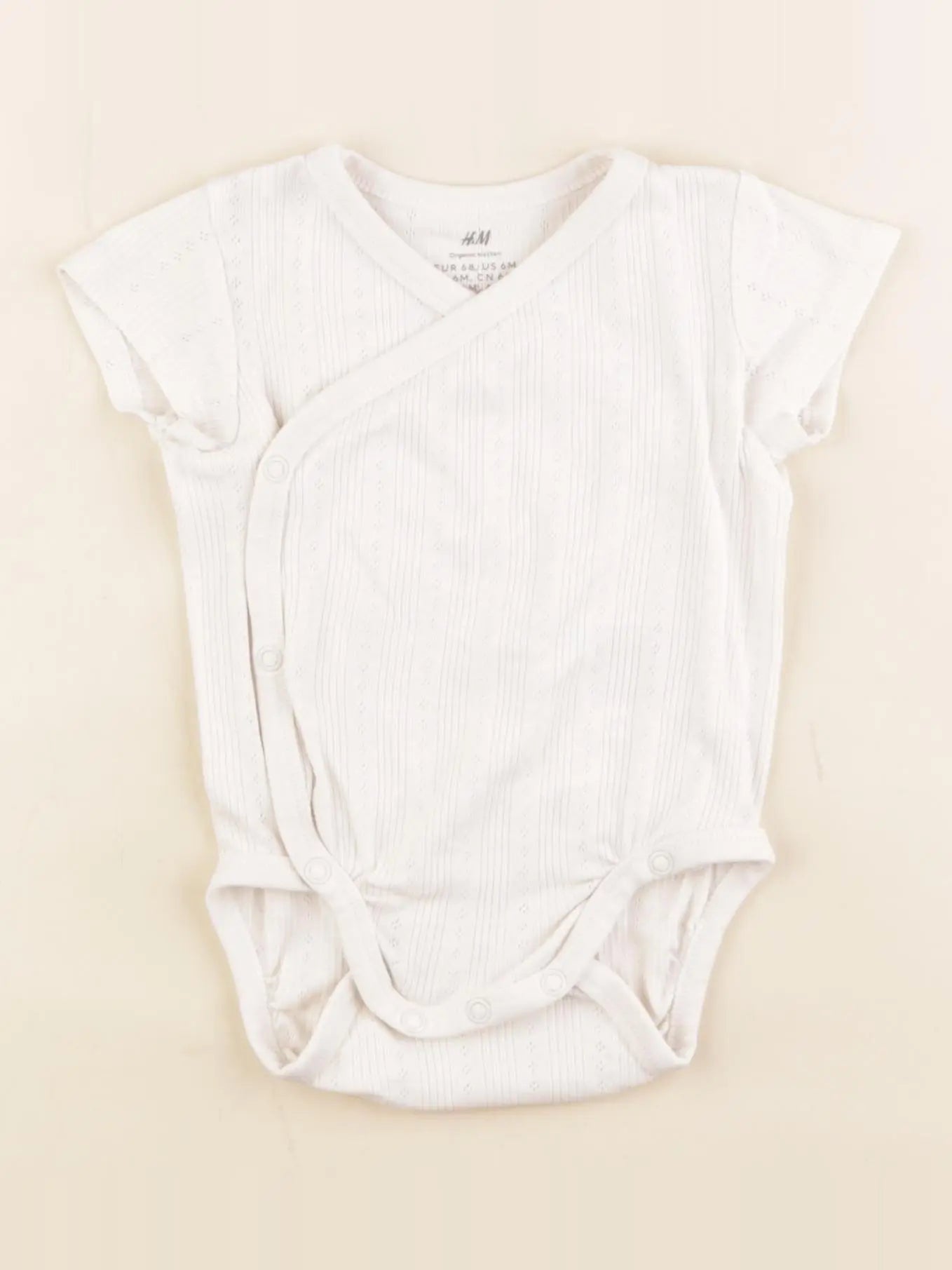 H&M - body beige - 6 mois