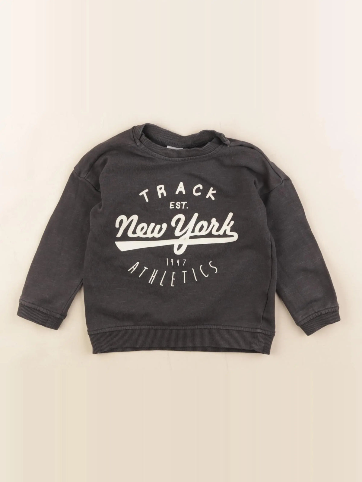 H&M - sweat noir - 9/12 mois