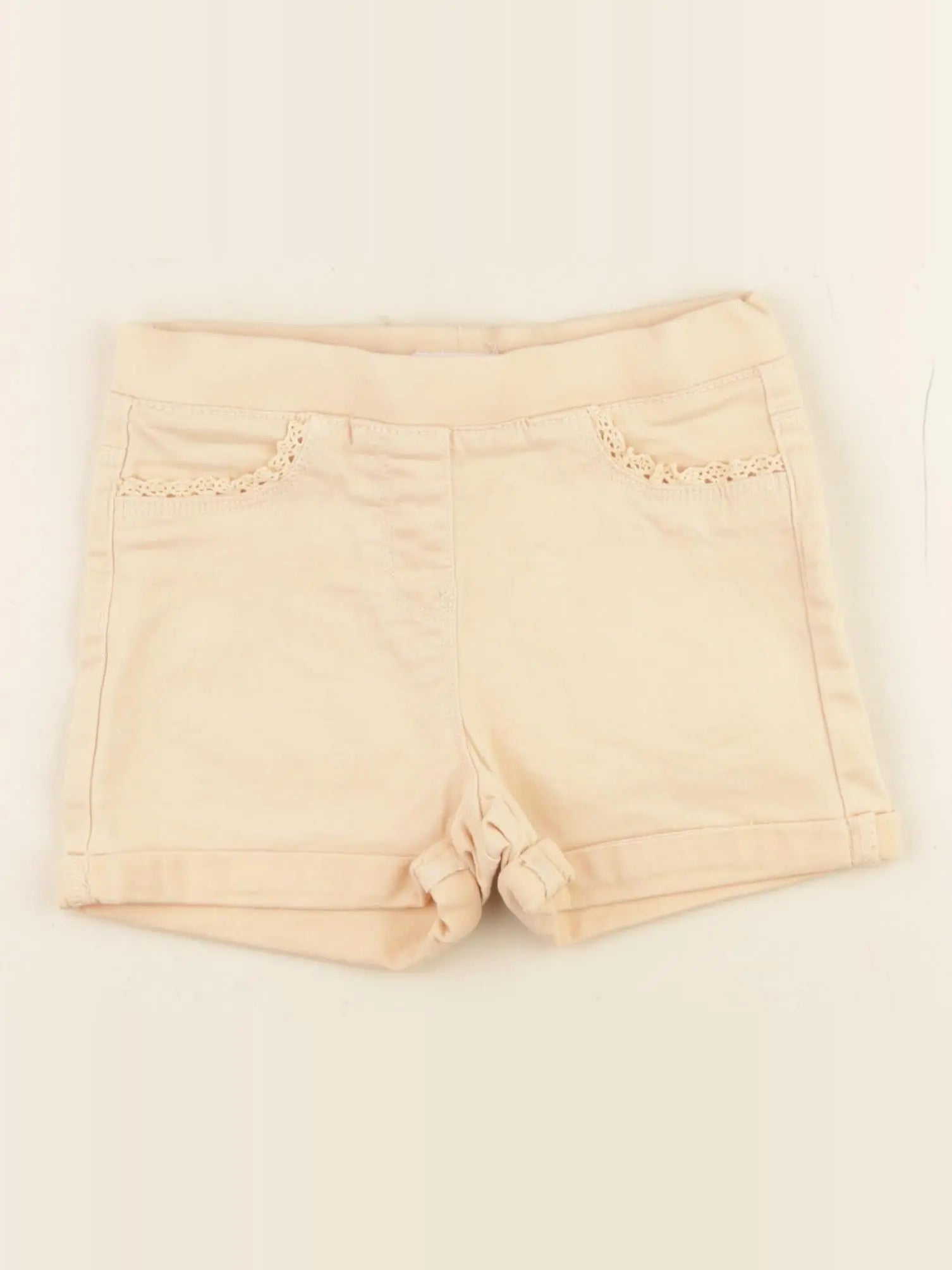 Vertbaudet - short orange - 7 ans