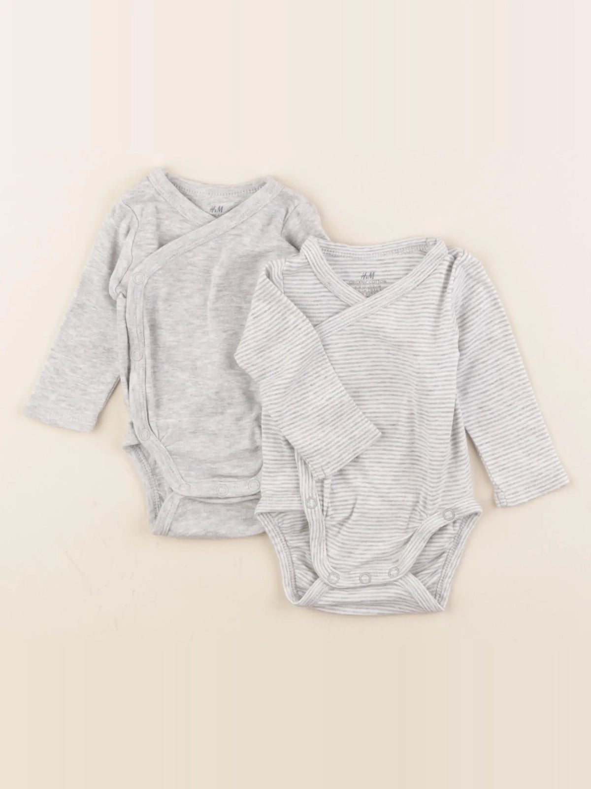 H&M - lot de 2 bodies en coton gris - 0/1 mois