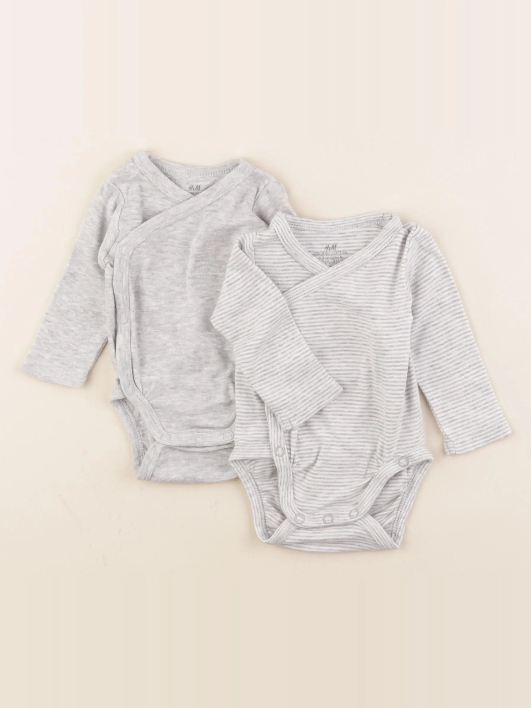 H&M - lot de 2 bodies en coton gris - 0/1 mois