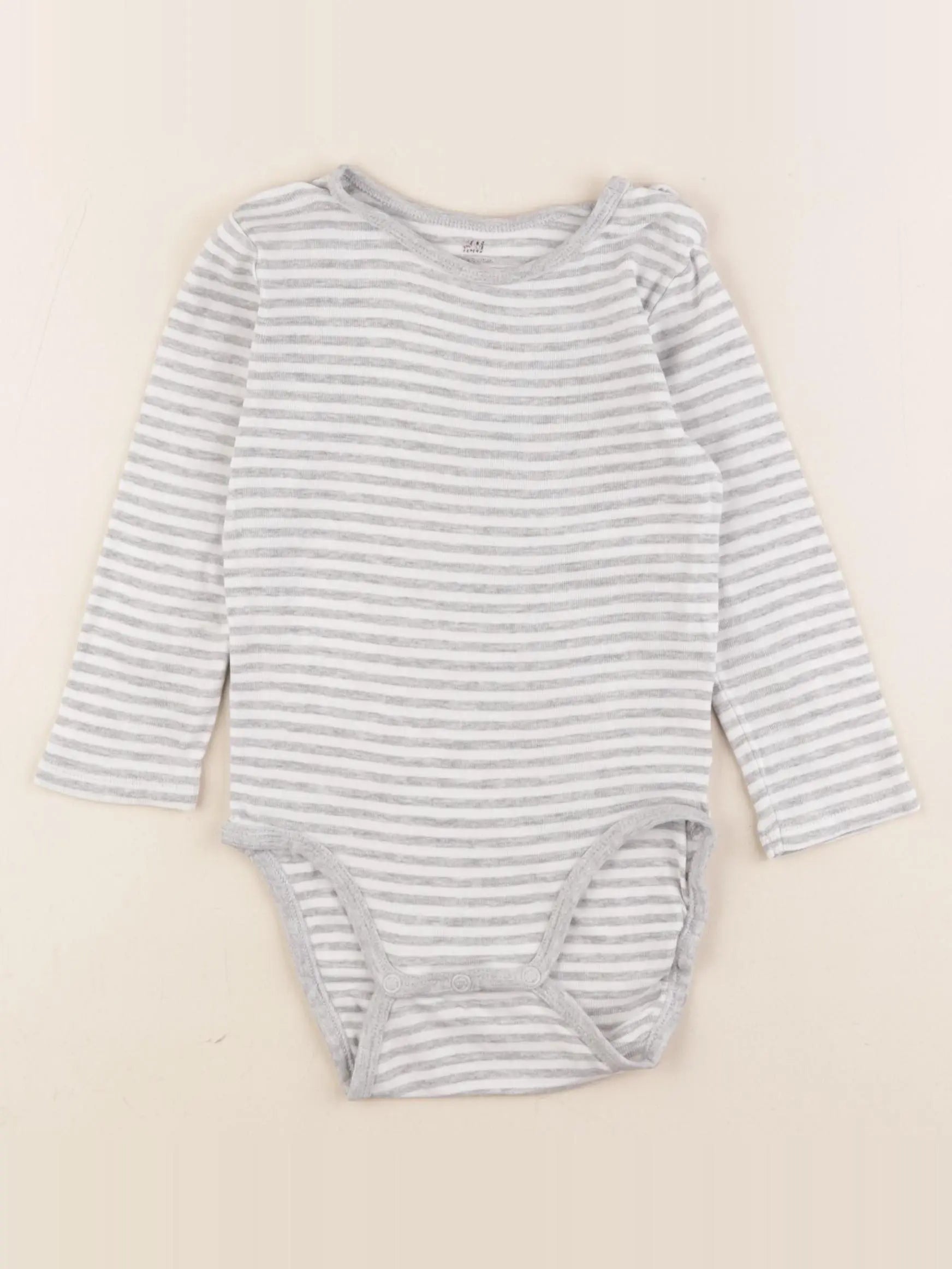 H&M - body gris - 12/18 mois