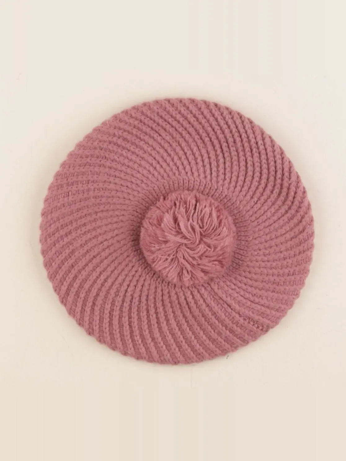 Uniqlo - bonnet rose - 7 ans