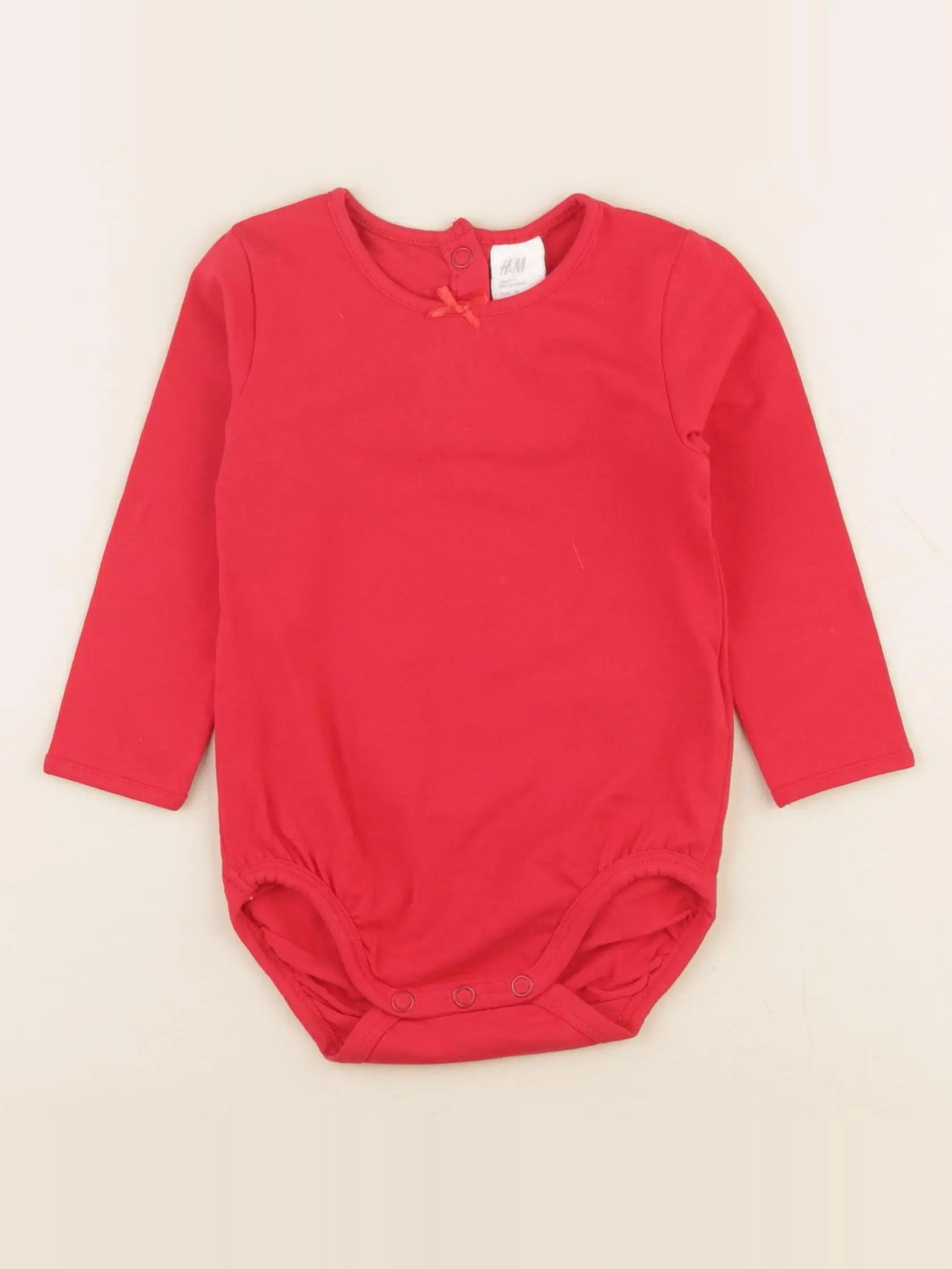 H&M - body rouge - 6/9 mois