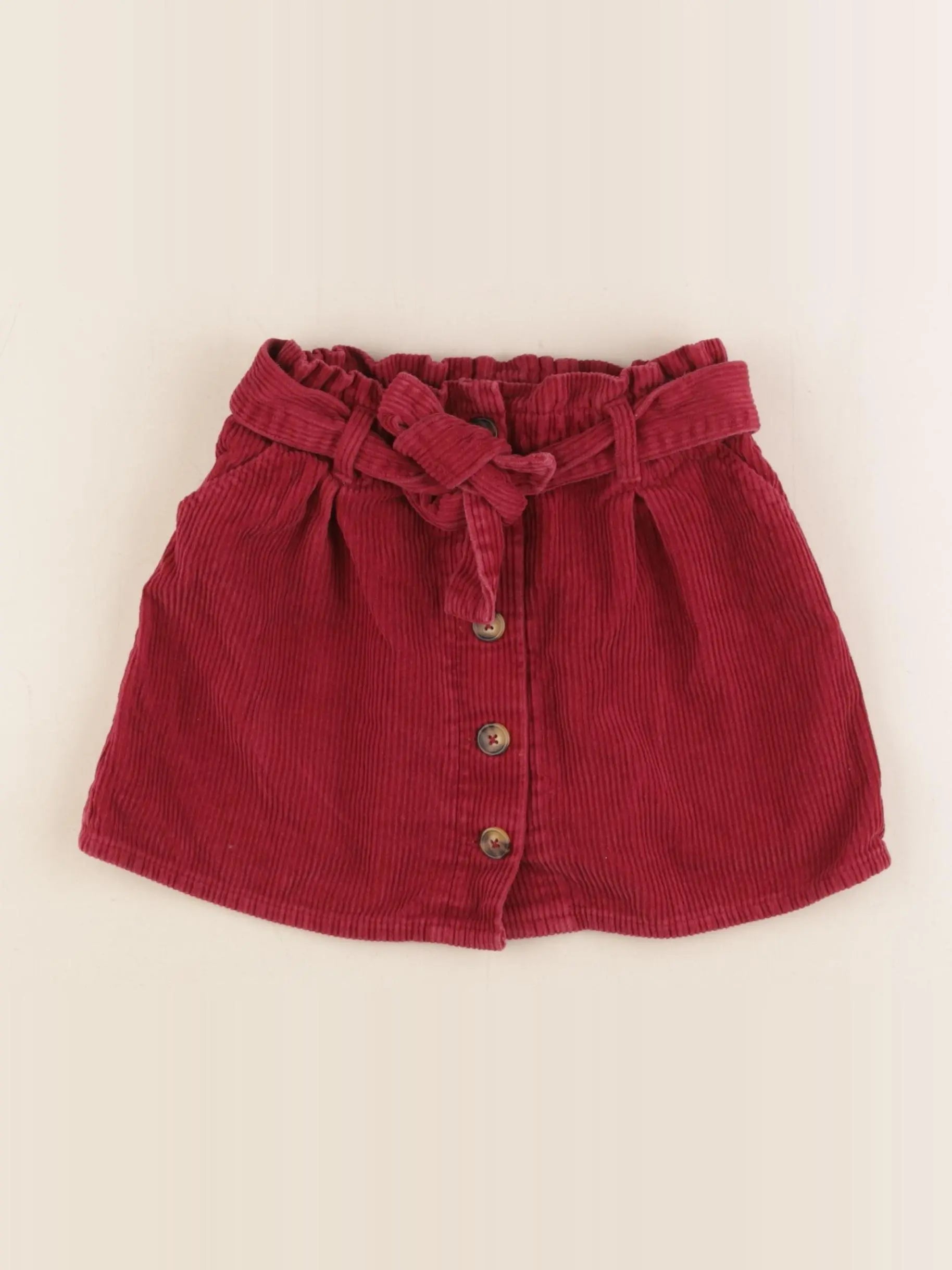 Vertbaudet - jupe rouge - 7 ans