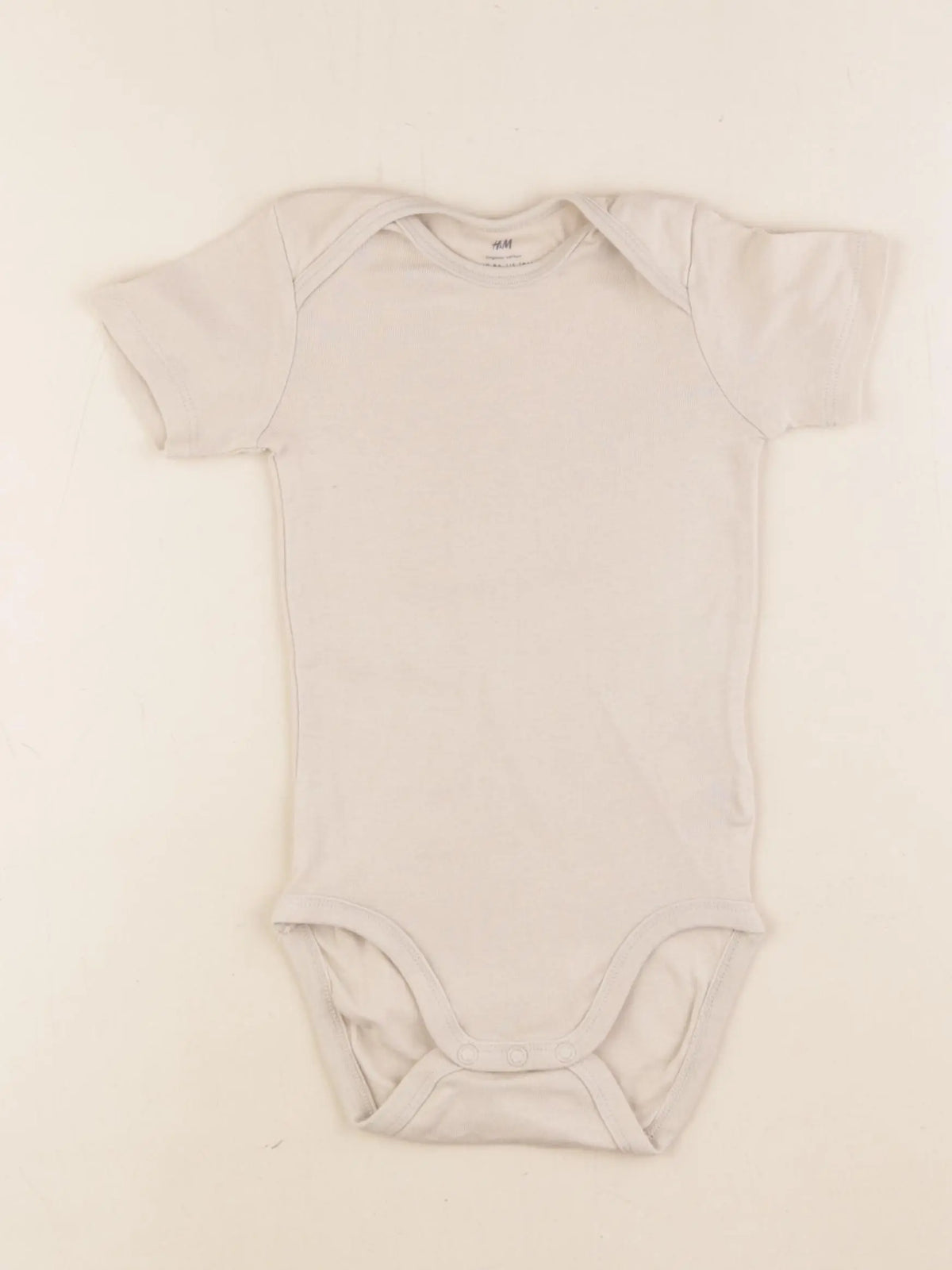 H&M - body beige - 12/18 mois