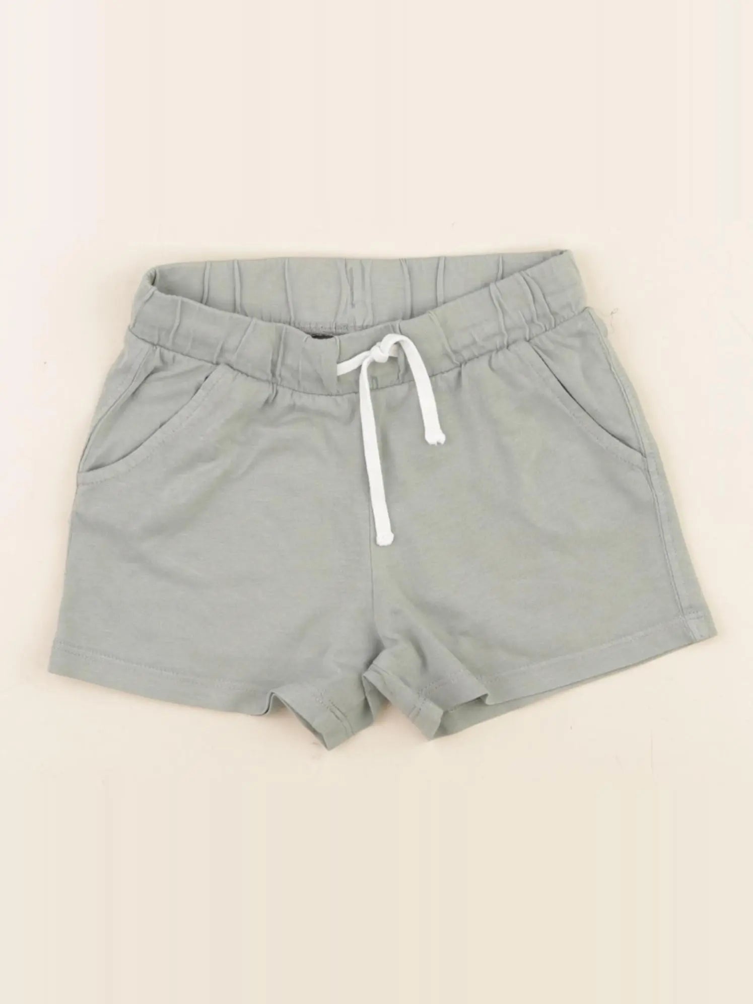 H&M - short vert - 18/24 mois