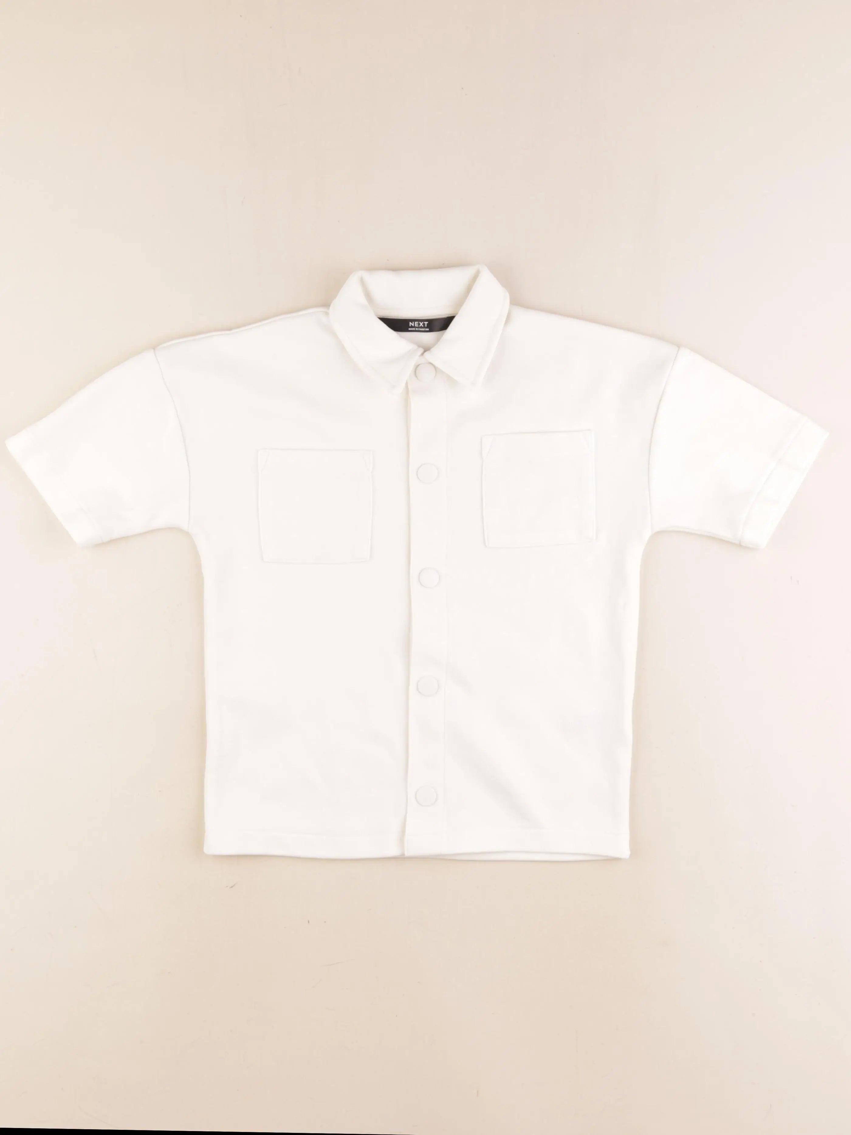 Next - polo beige - 6 ans