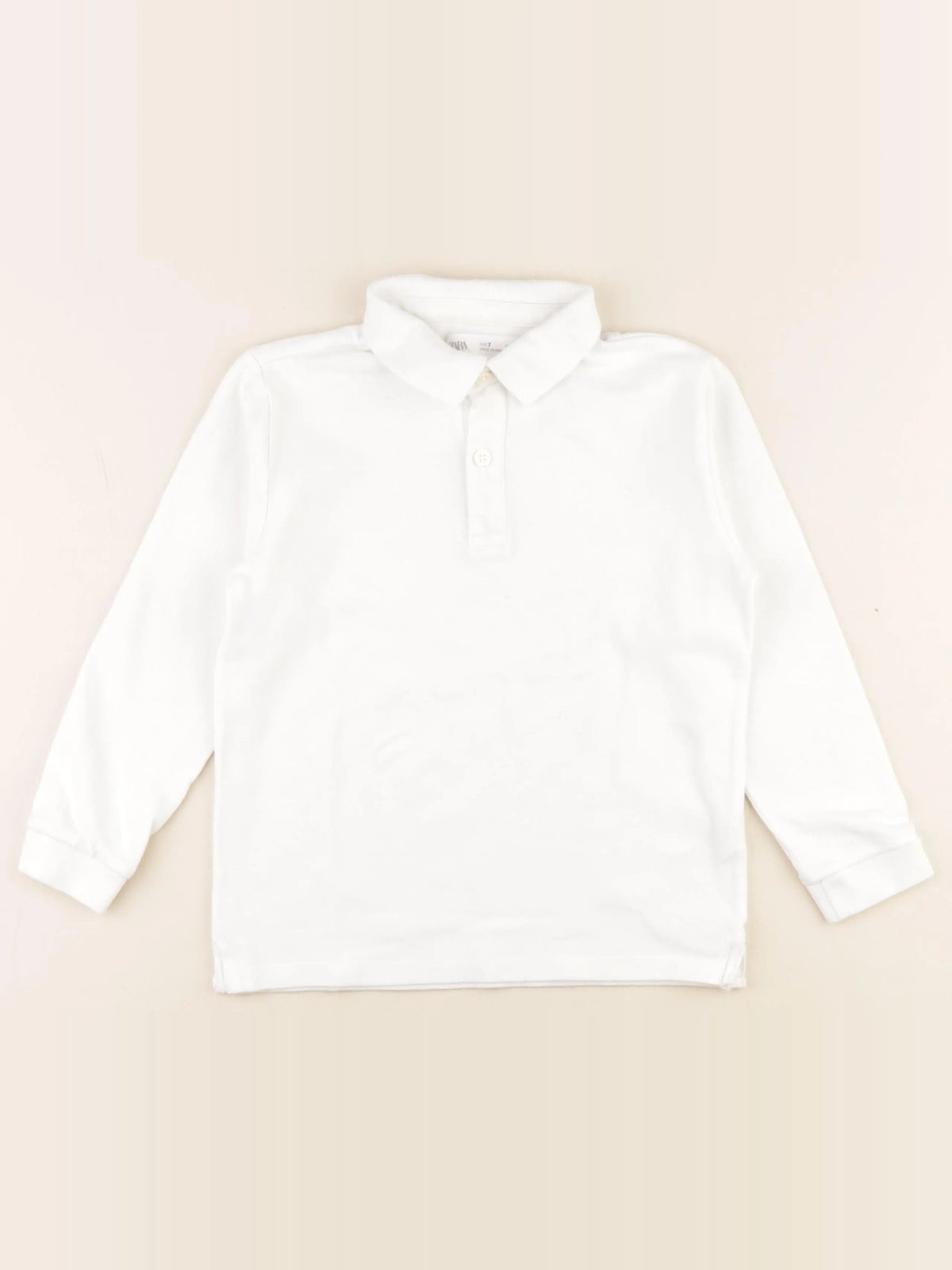 Zara - polo blanc - 7 ans
