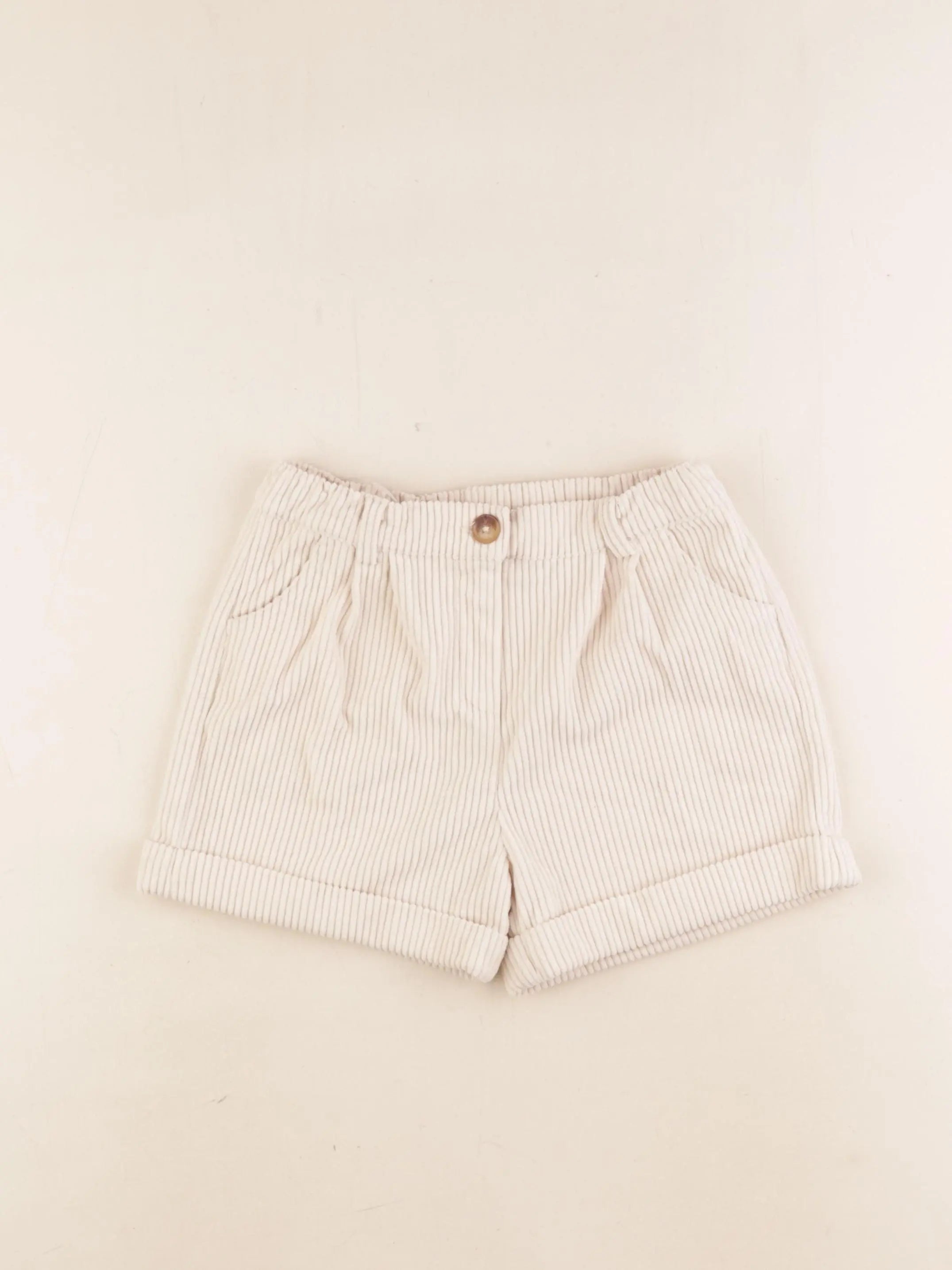 Vertbaudet - short beige - 7 ans