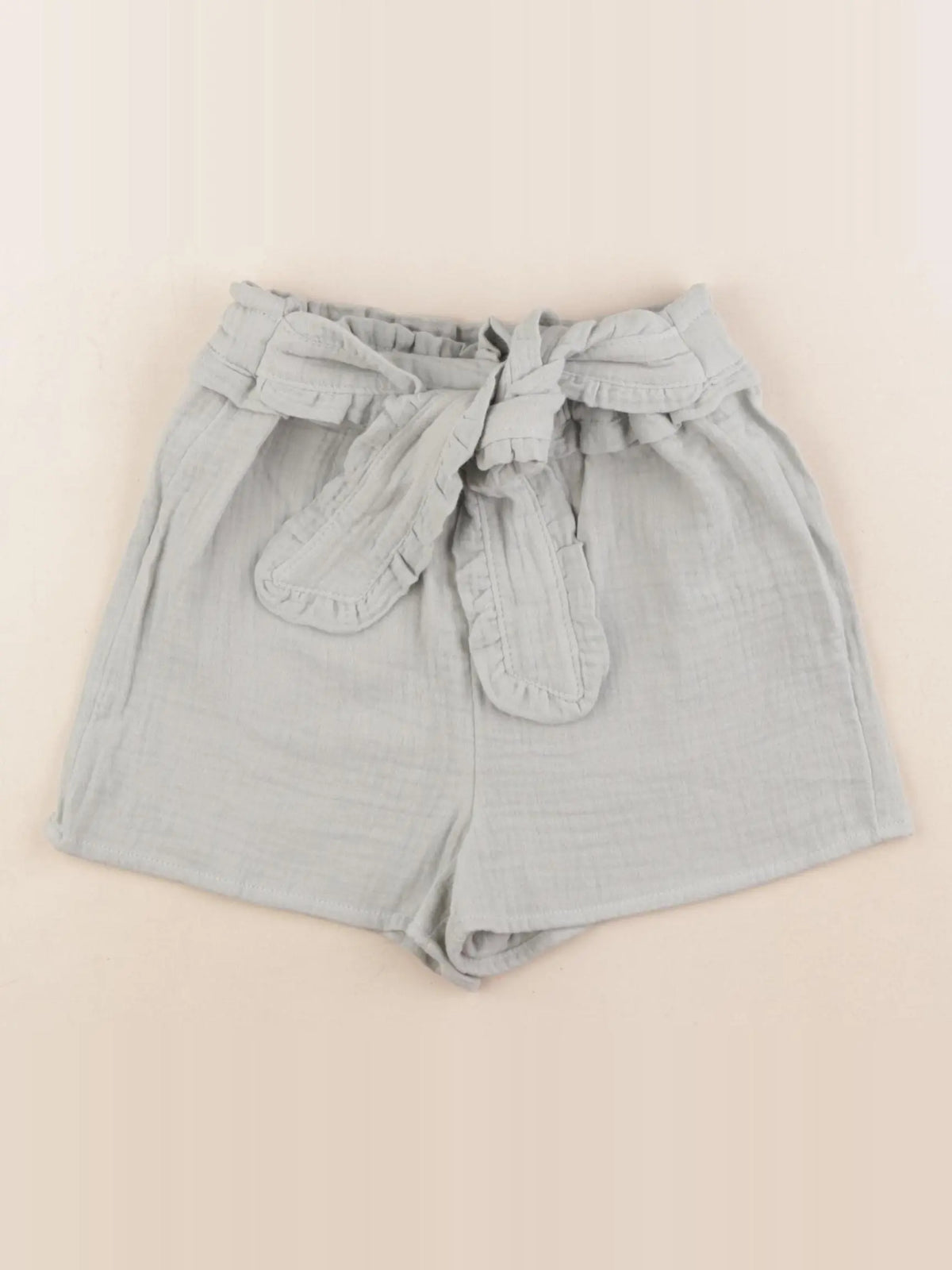 Vertbaudet - short vert - 7 ans