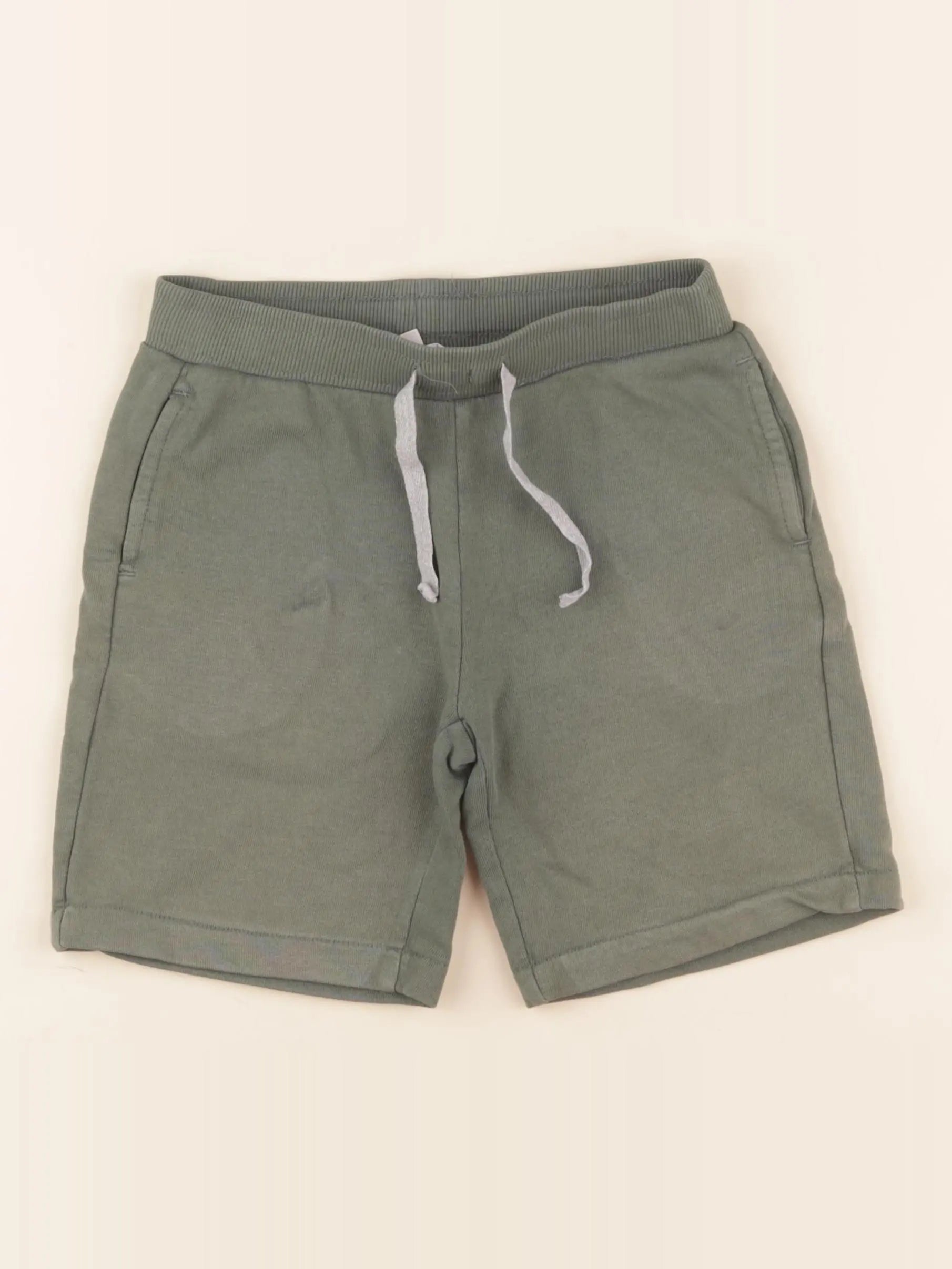 Vertbaudet - short vert - 7 ans