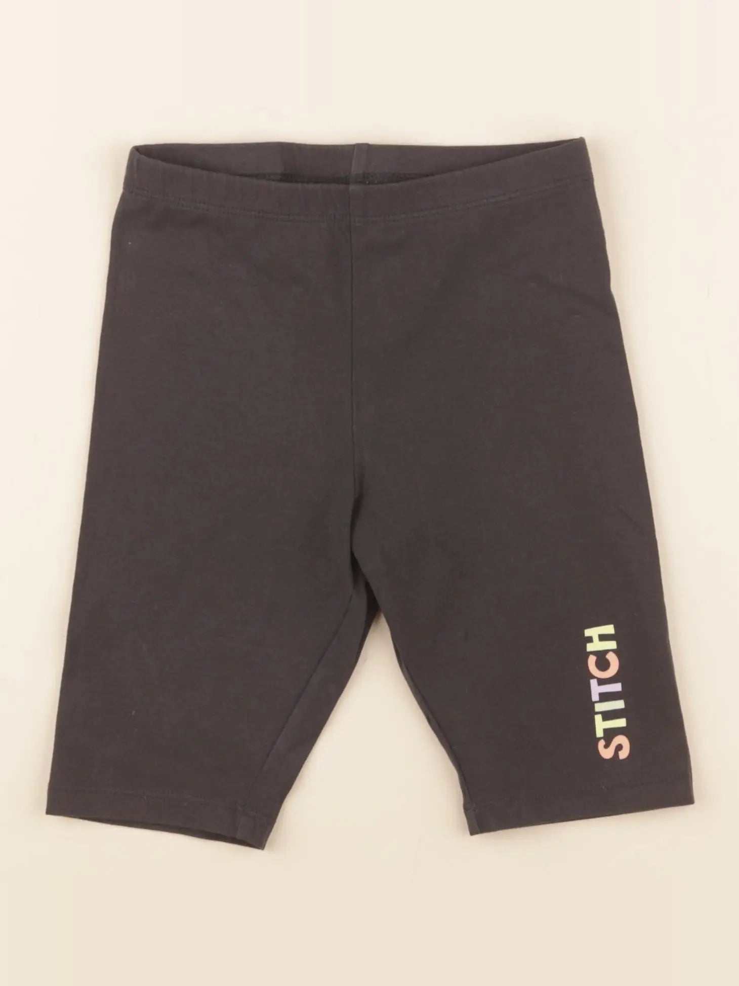 H&M - short noir - 6/7 ans