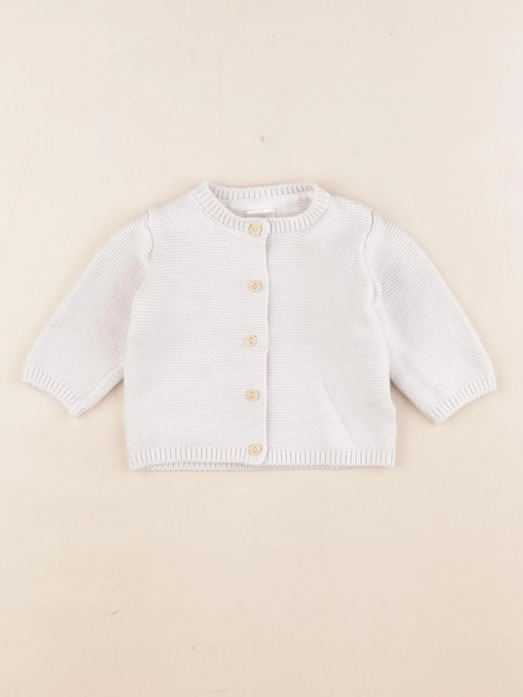 H&M - gilet blanc - 1/2 mois