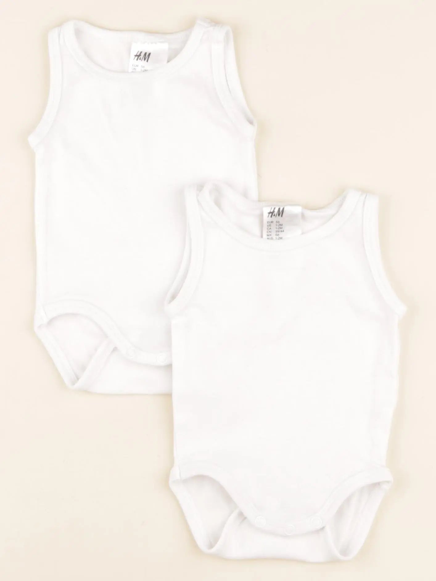H&M - lot de 2 bodies en coton blanc - 1/2 mois