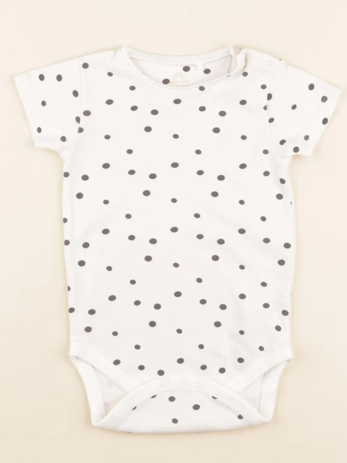 Next - body beige - 12/18 mois