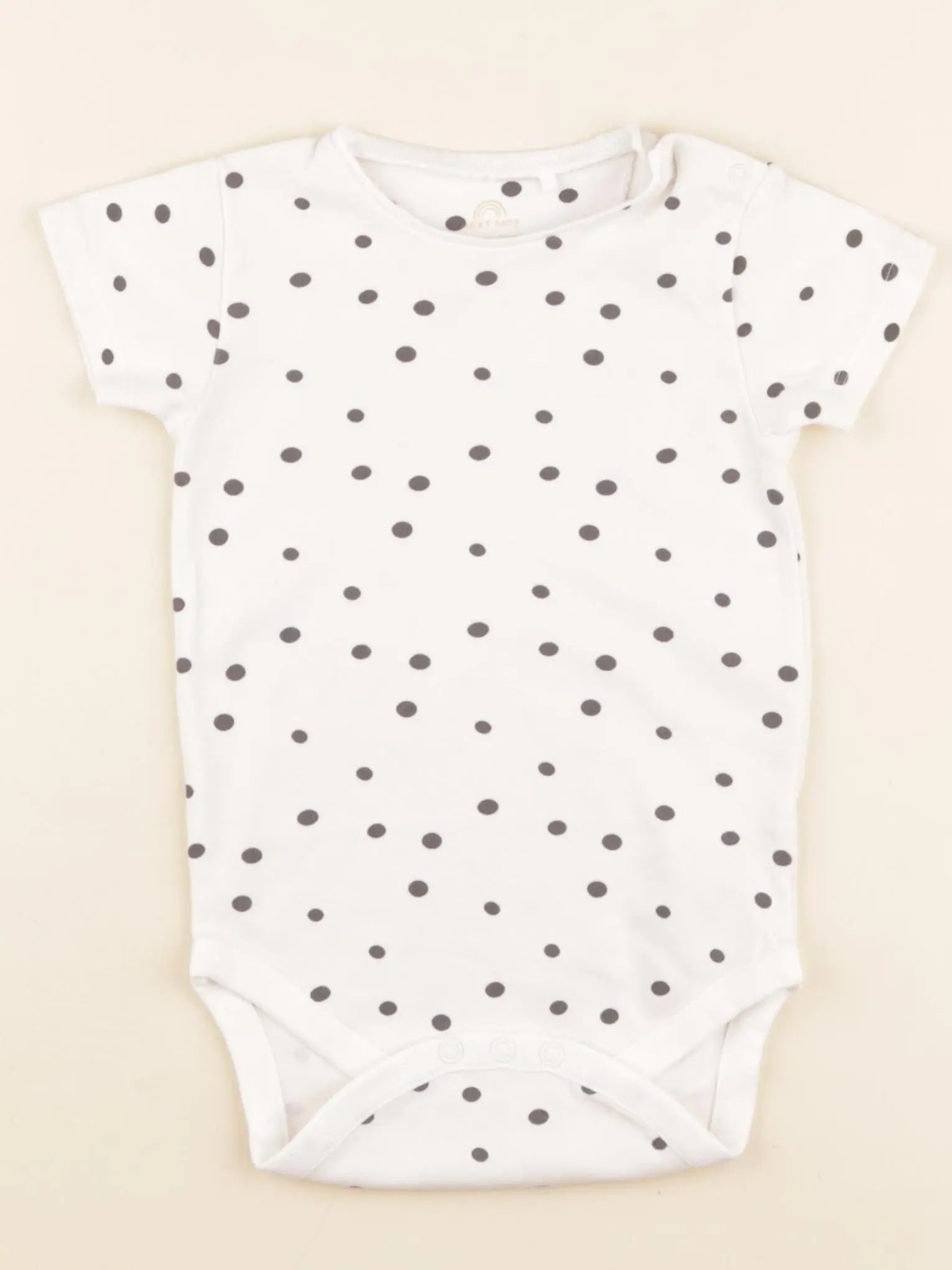 Next - body beige - 12/18 mois