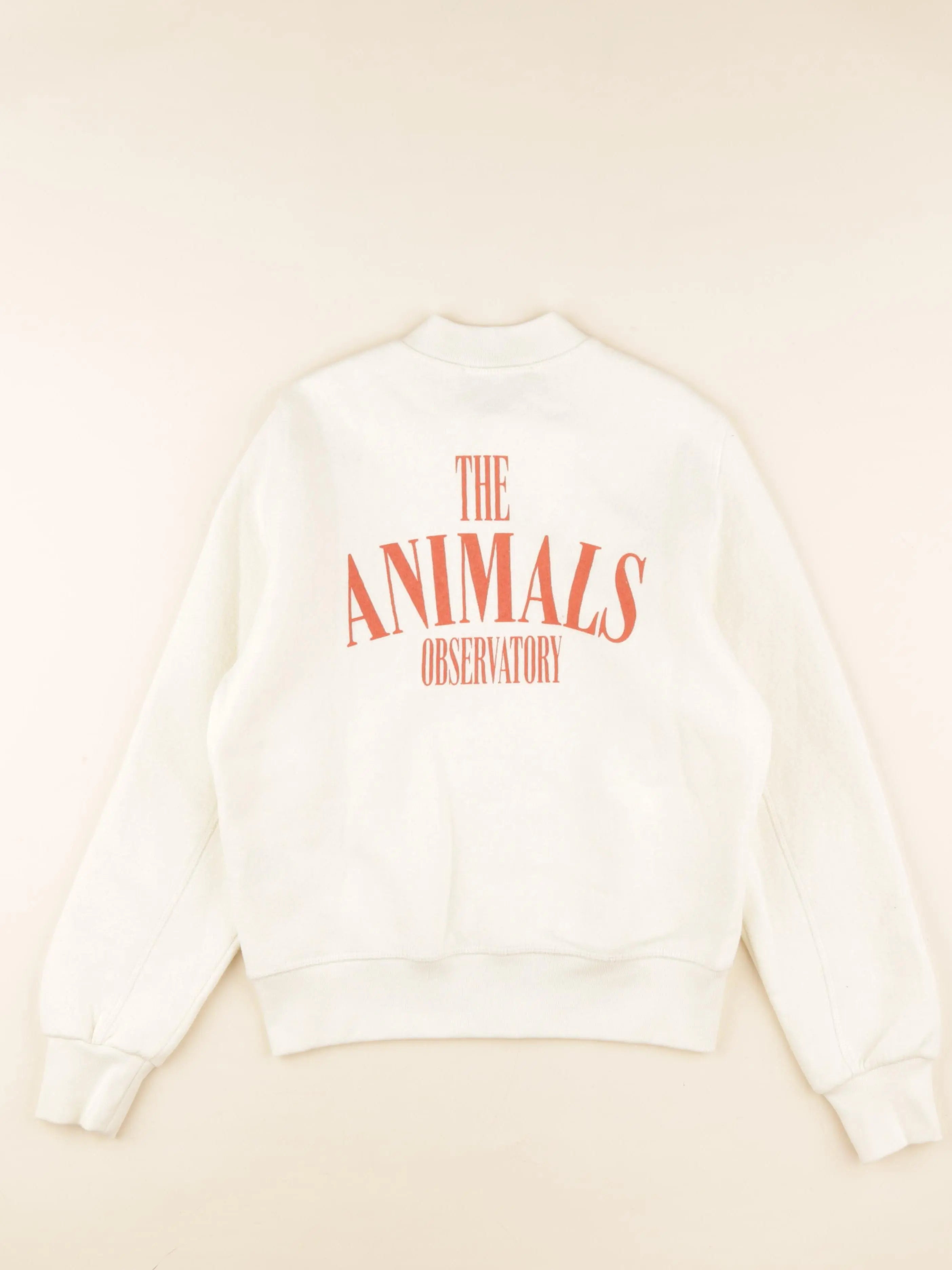 Sweat imprimé au dos beige