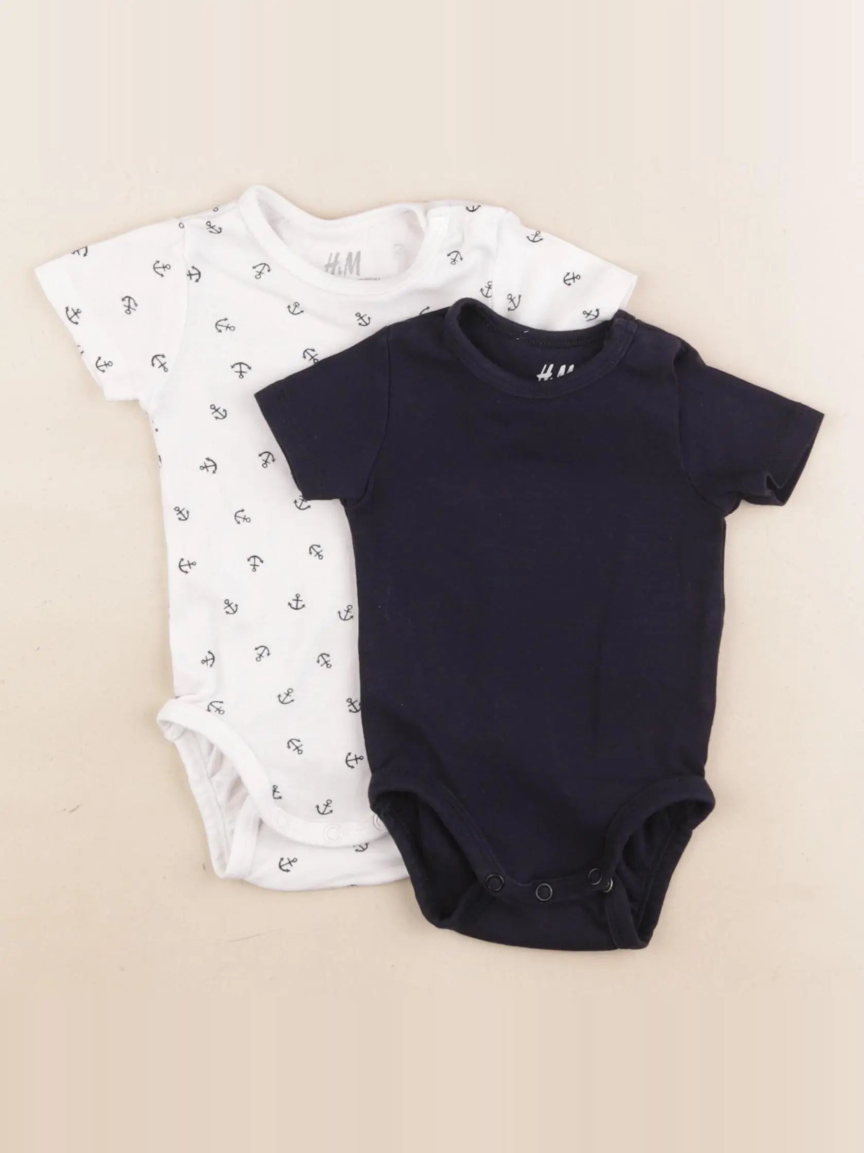 H&M - lot de 2 bodies en coton blanc, bleu - 2/4 mois
