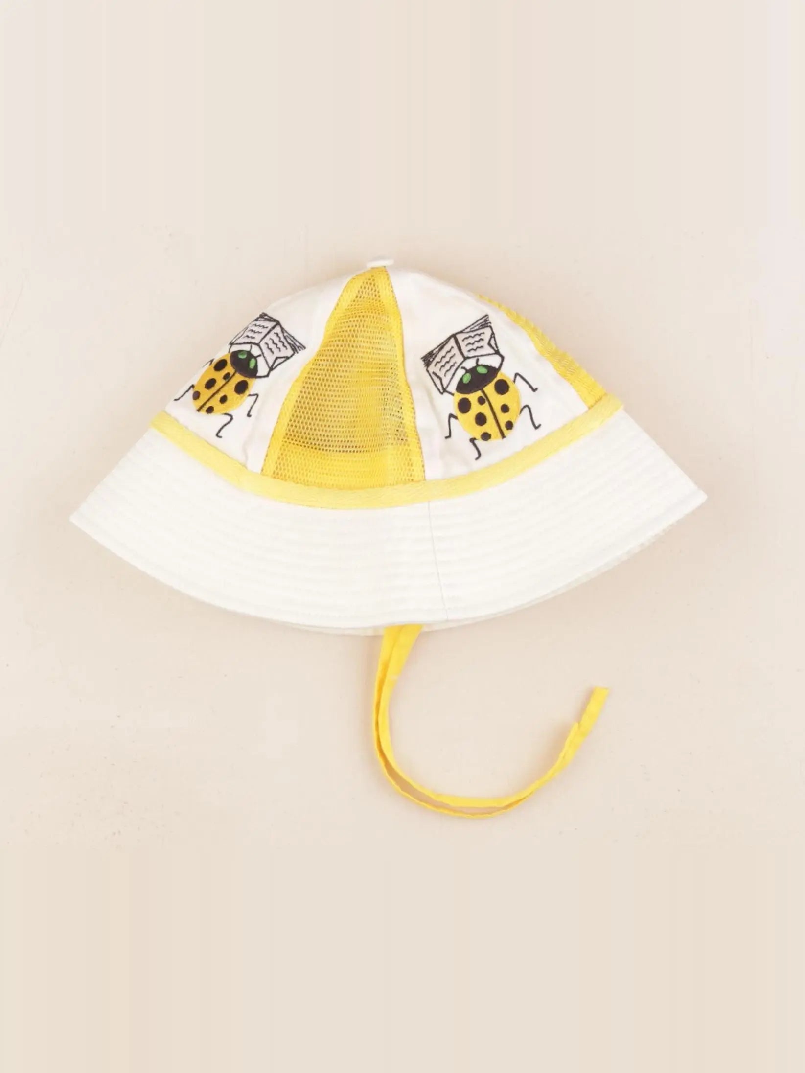 Mini Rodini - chapeau jaune - 4/6 ans