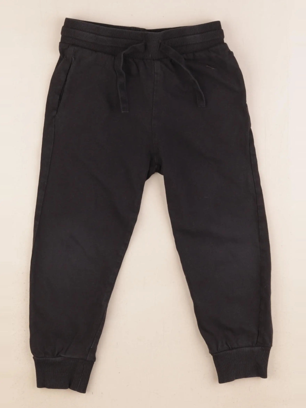 H&M - jogging noir - 3/4 ans