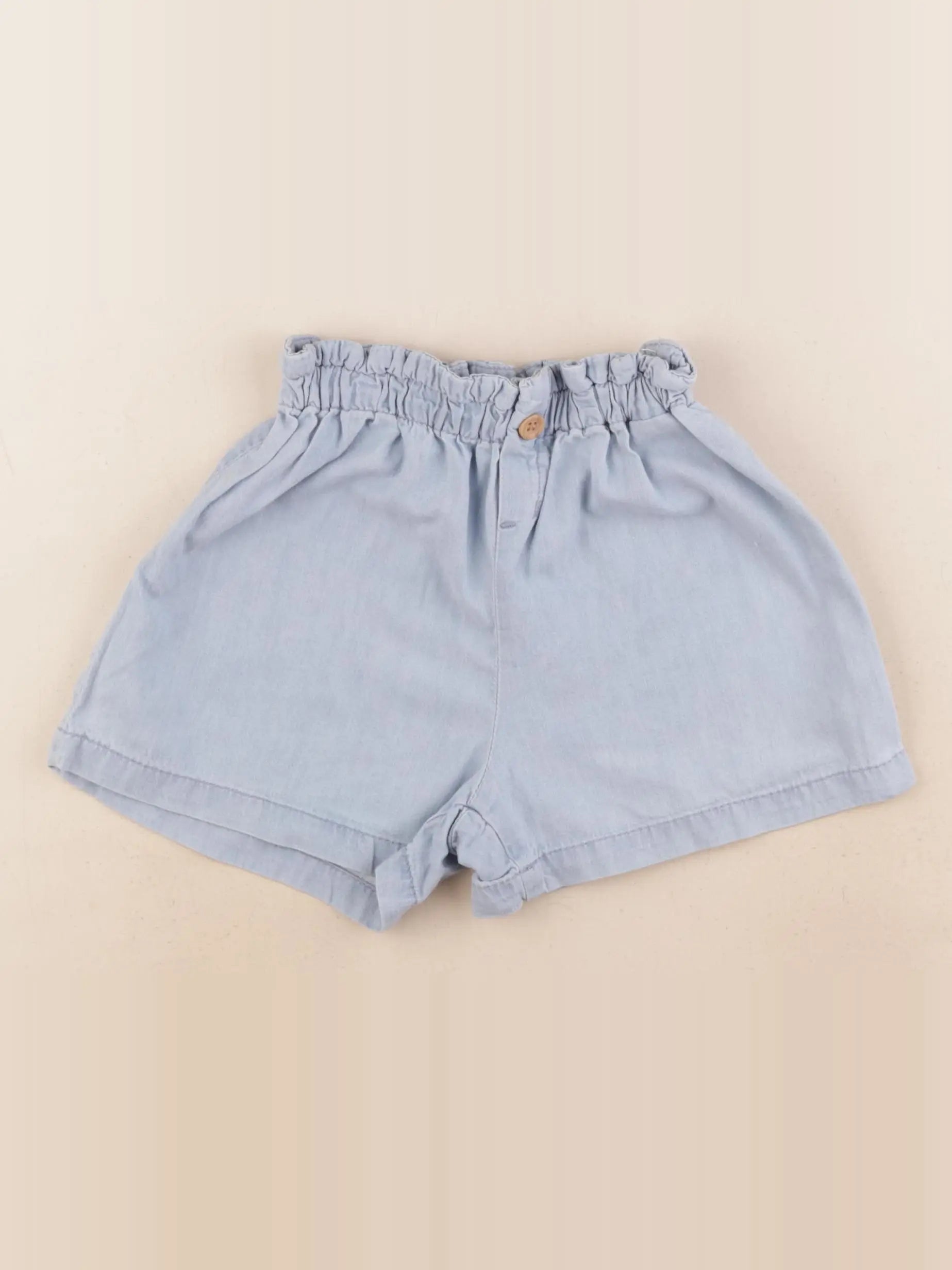 H&M - short bleu - 3/4 ans