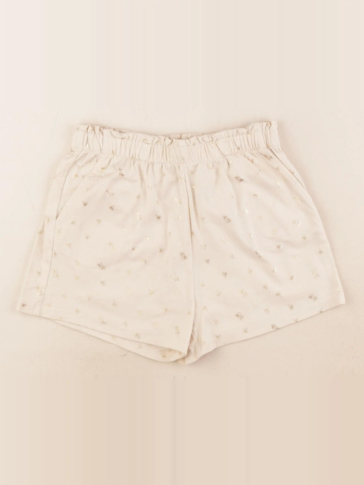 H&M - short beige - 7/8 ans