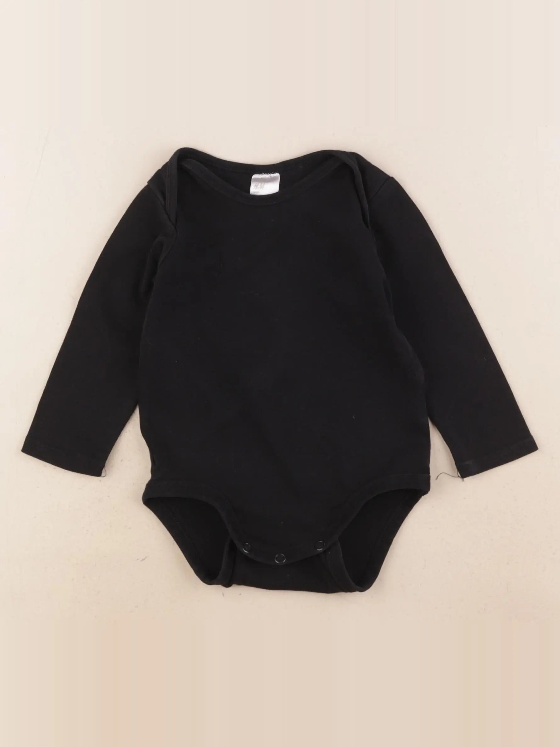 H&M - body noir - 9/12 mois