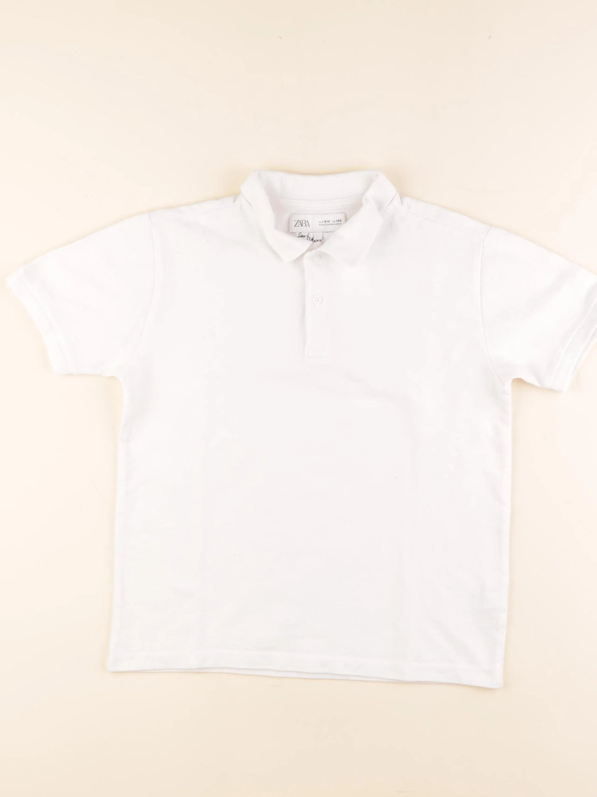 Zara - polo blanc - 9/10 ans