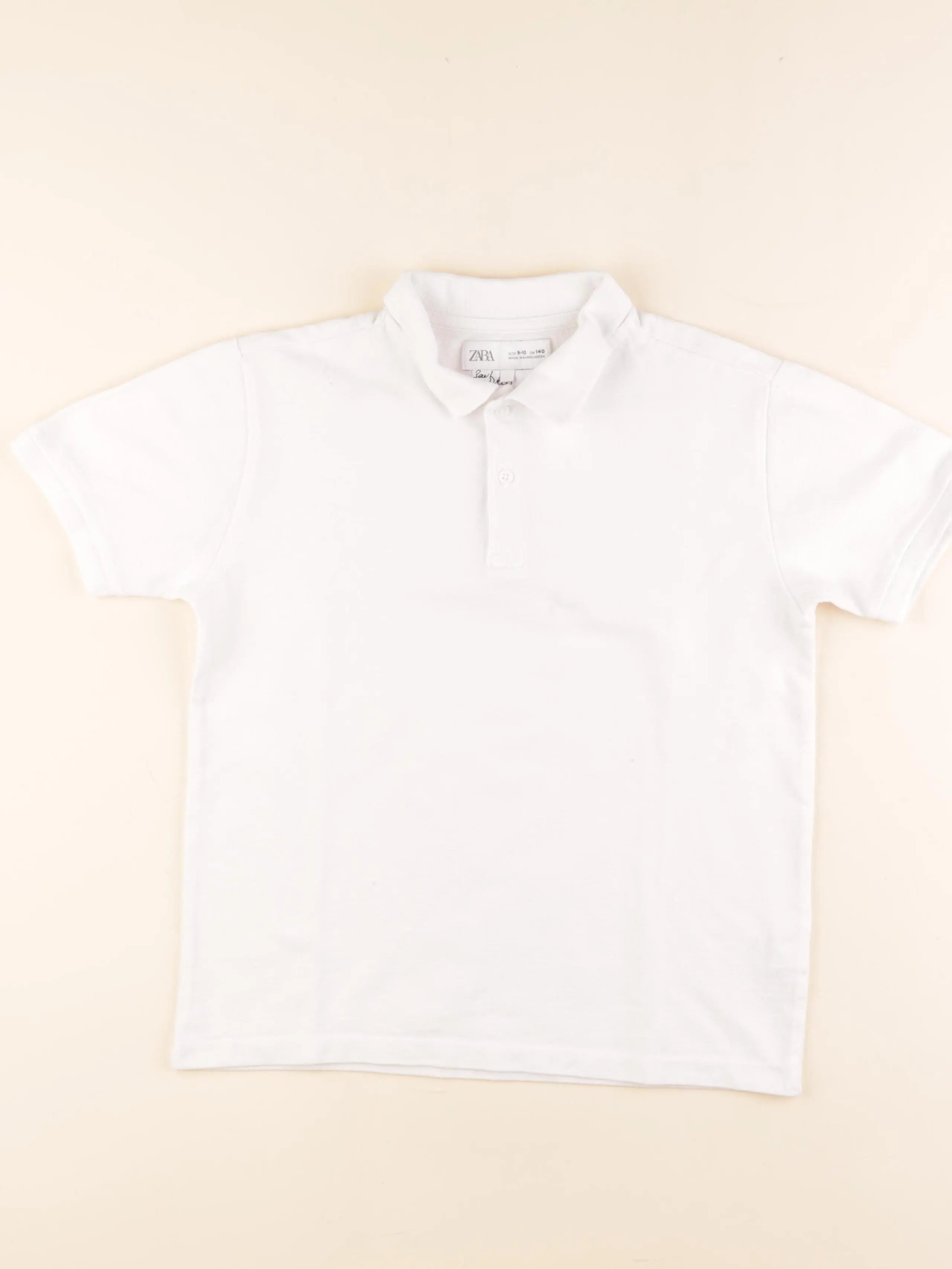 Zara - polo blanc - 9/10 ans