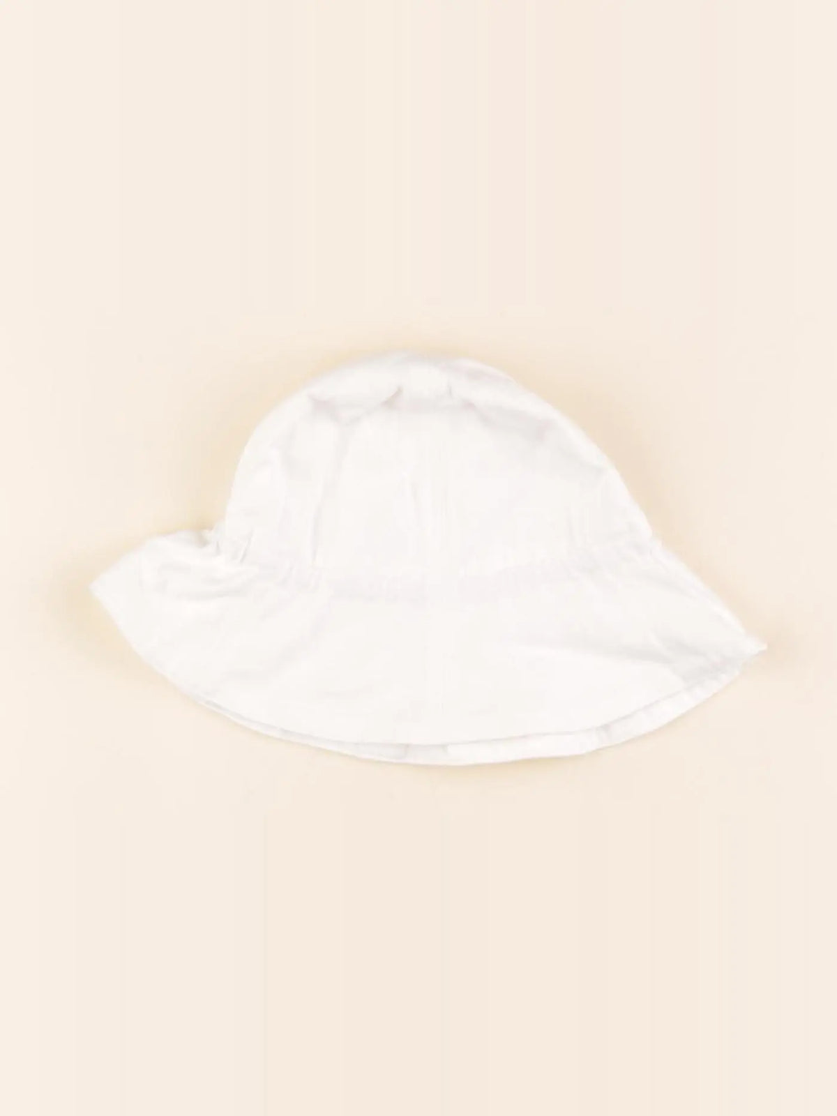 Uniqlo - chapeau blanc - 6/18 mois