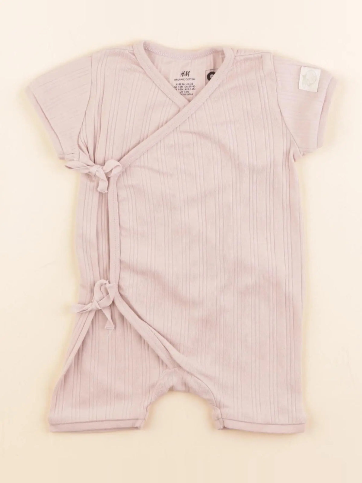 H&M - body rose - 1/2 mois