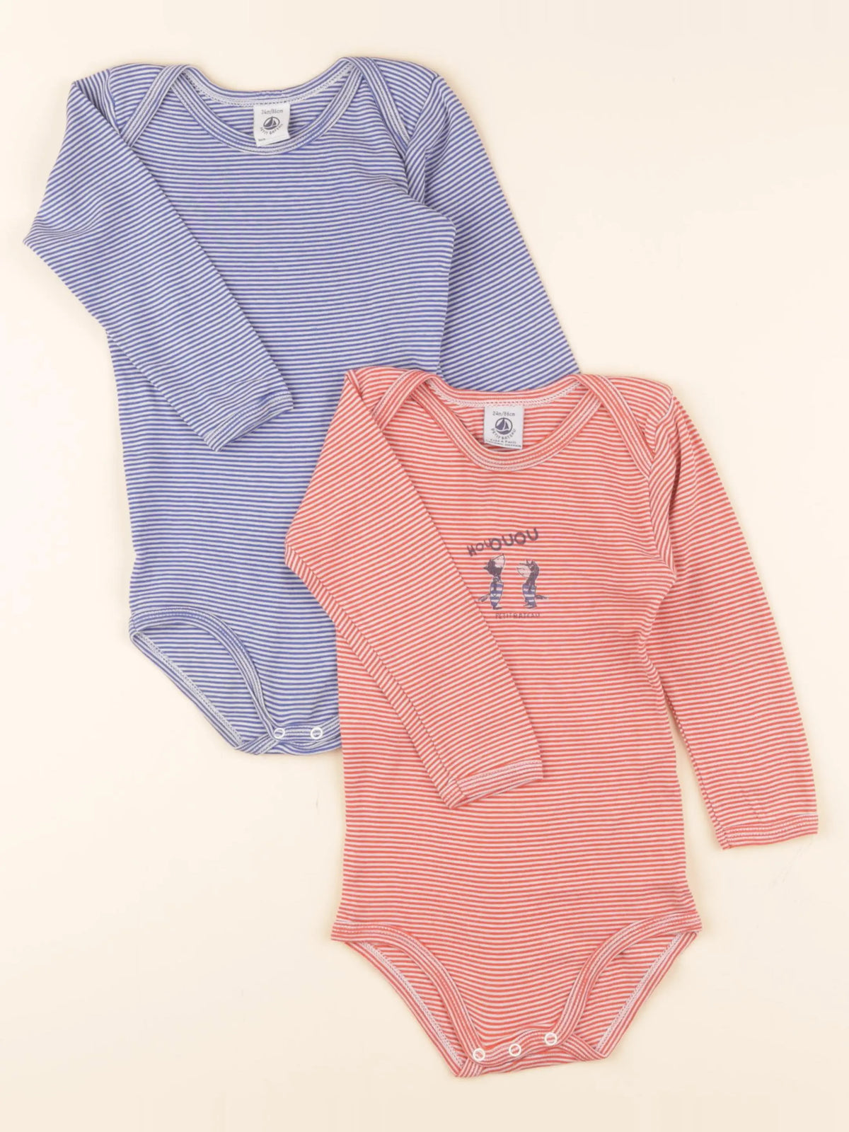 Lot de 2 bodies en coton bleu, rouge
