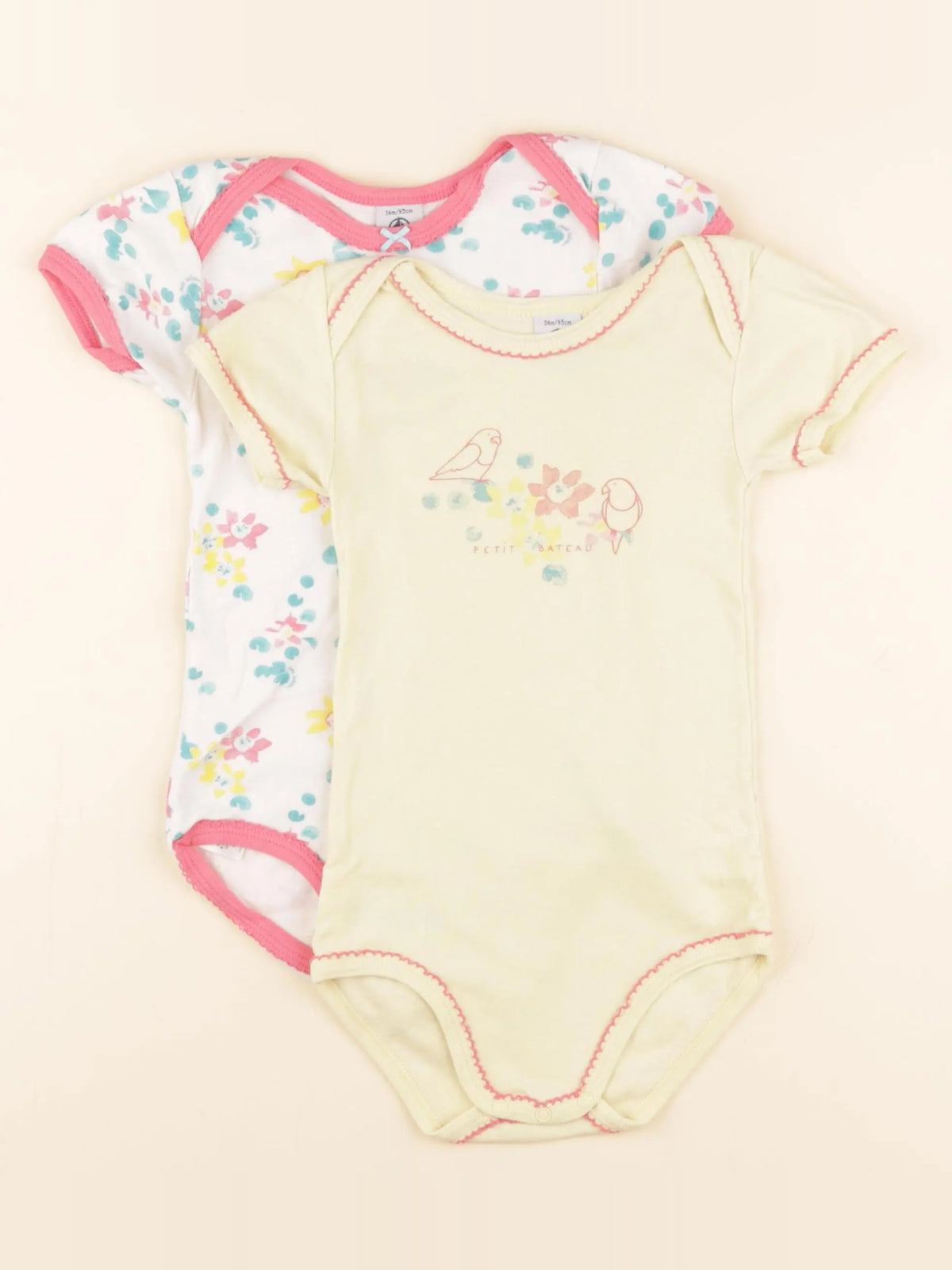 Lot de 2 bodies en coton jaune, rose
