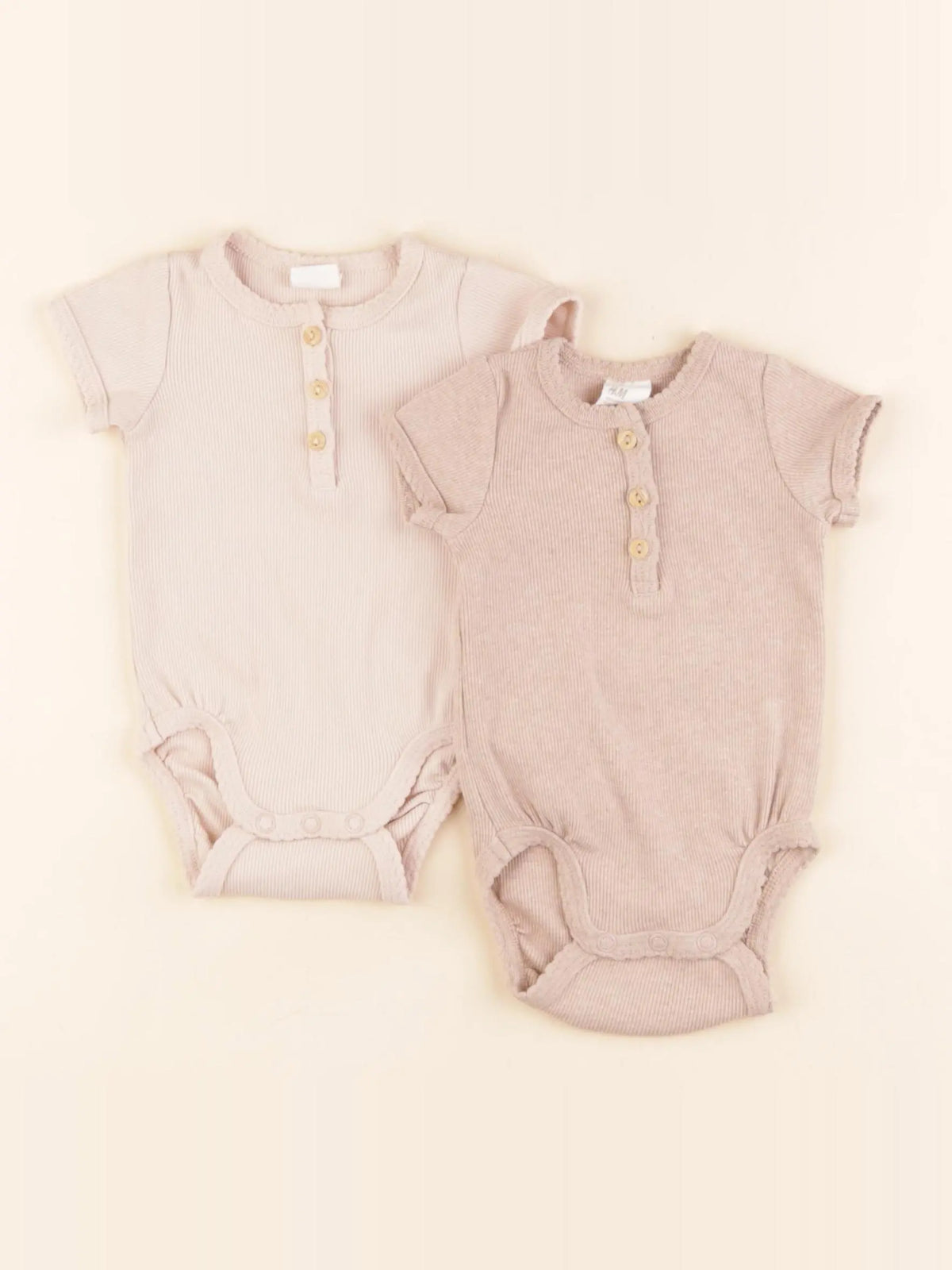 H&M - lot de 2 bodies en coton beige, rose - 1/2 mois