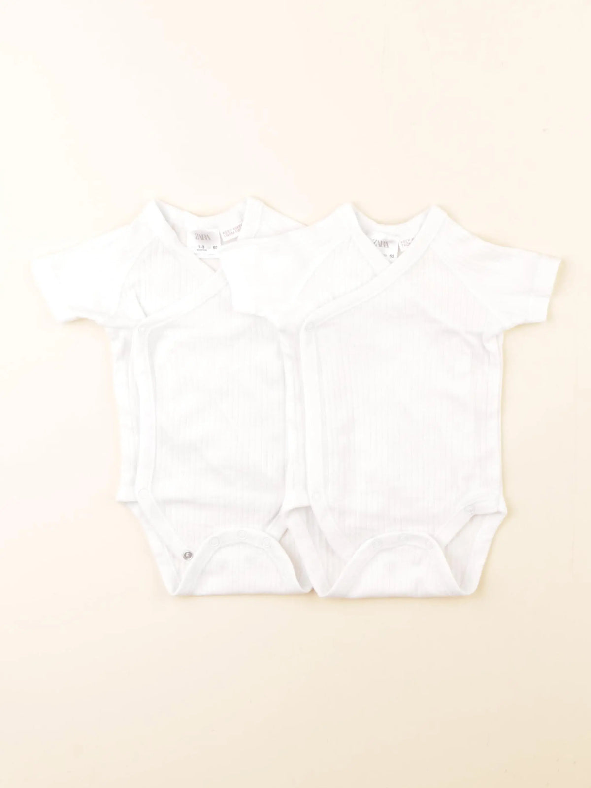 Zara - lot de 2 bodies en coton blanc - 1/3 mois