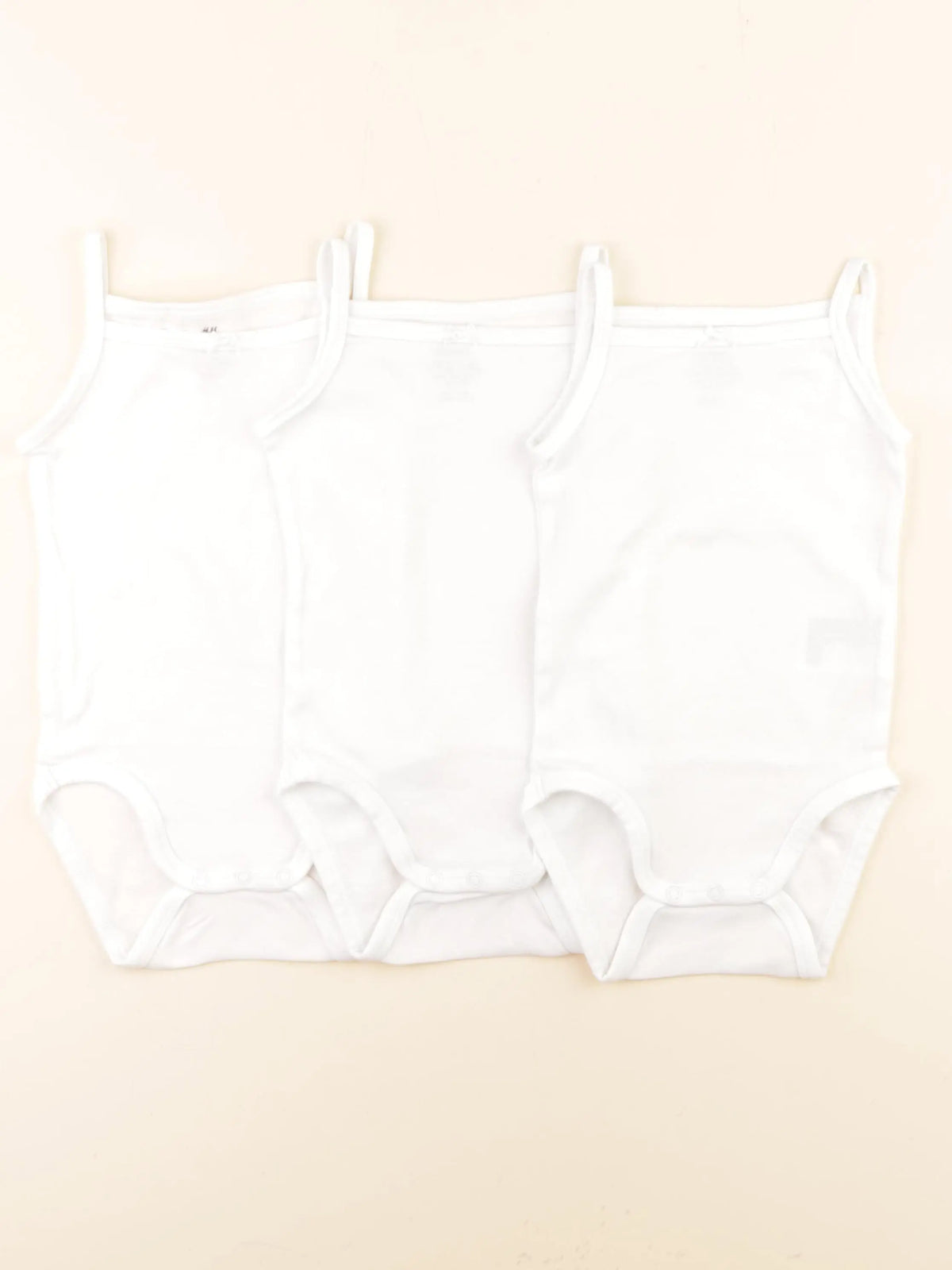 H&M - lot de 3 bodies en coton blanc - 9/12 mois